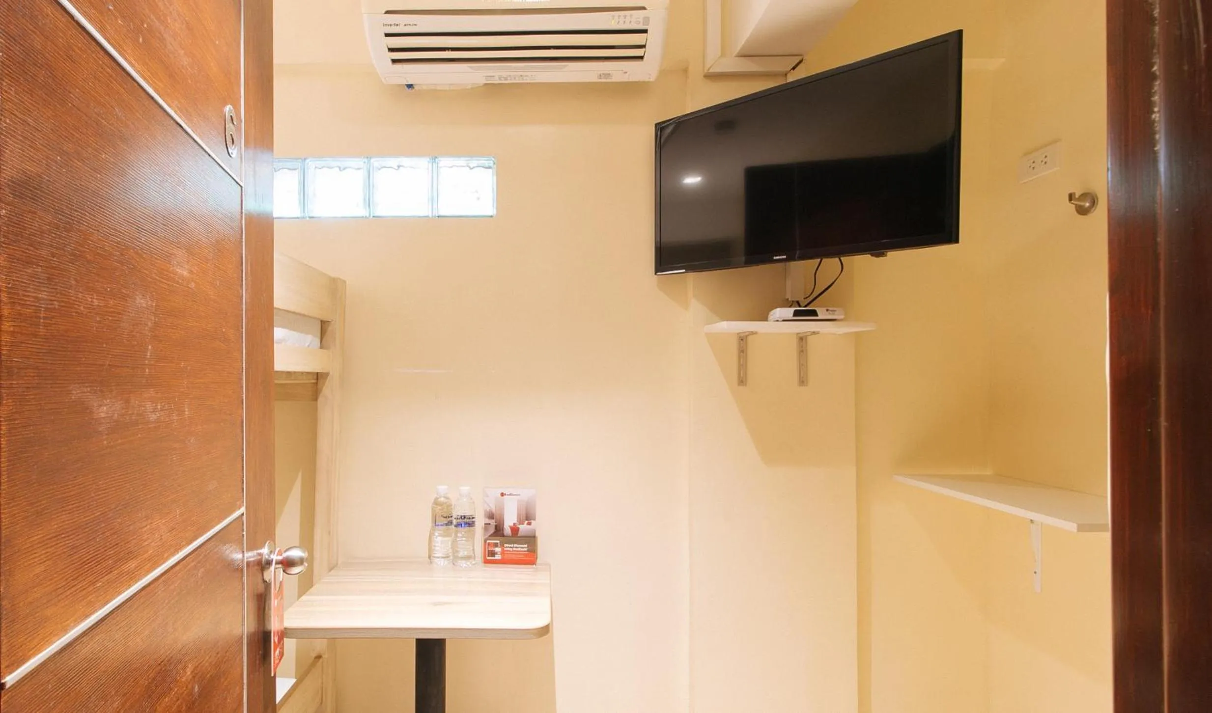 TV and multimedia in RedDoorz at Laiya Vivo Hotel Batangas