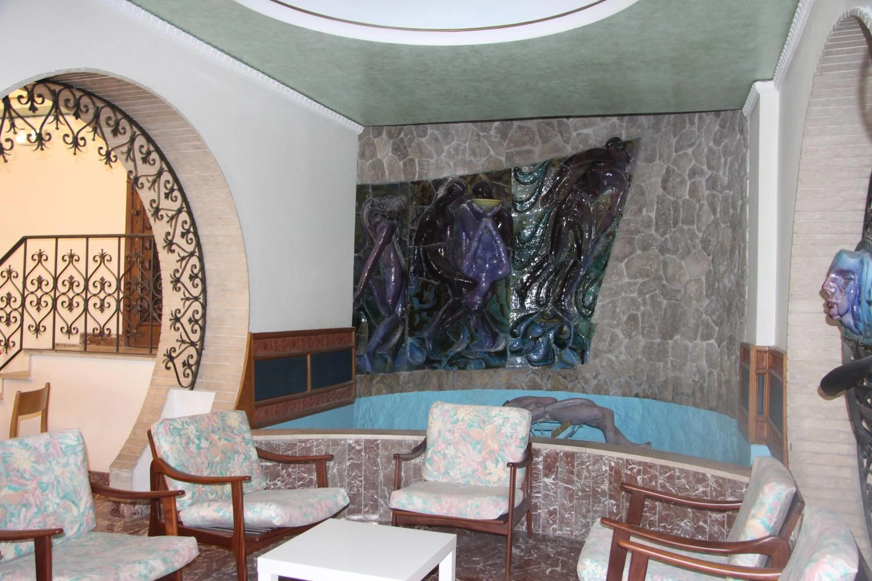 Communal lounge/ TV room in Hotel Vello d'Oro