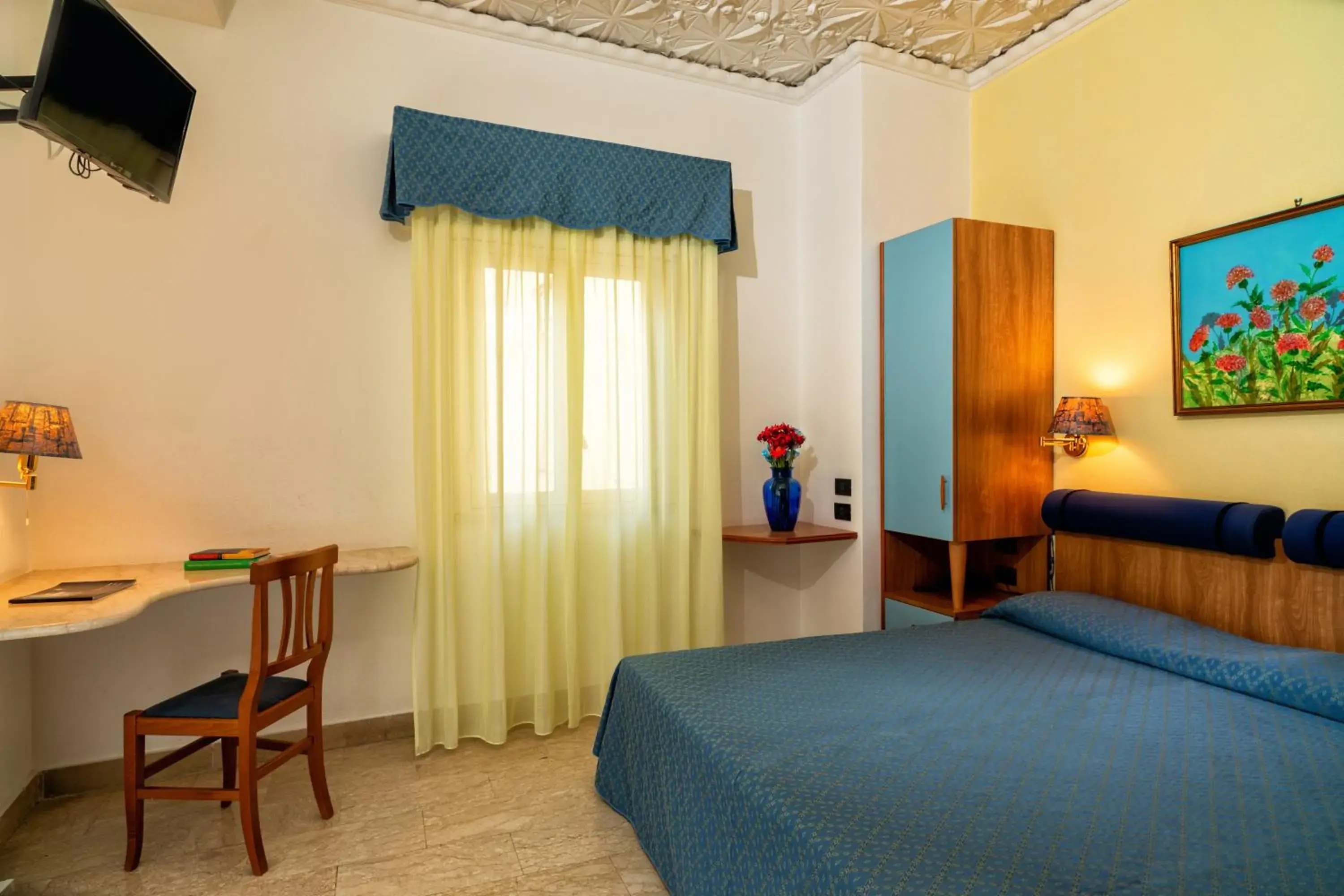 Bed in Hotel Vello d'Oro Bed in Hotel Vello d'Oro