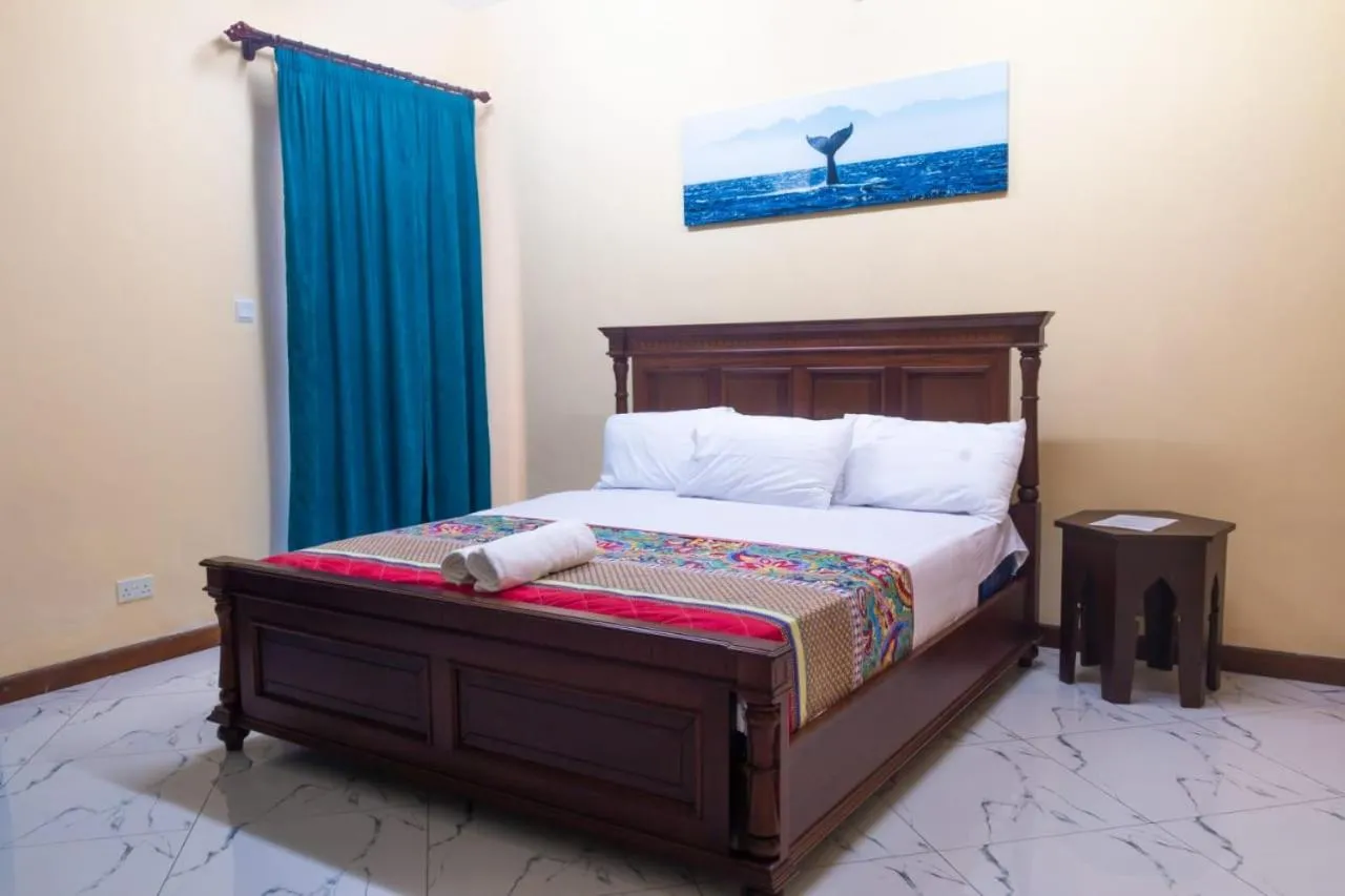 Bed in Lux Suites Le Royal Apartments Nyali