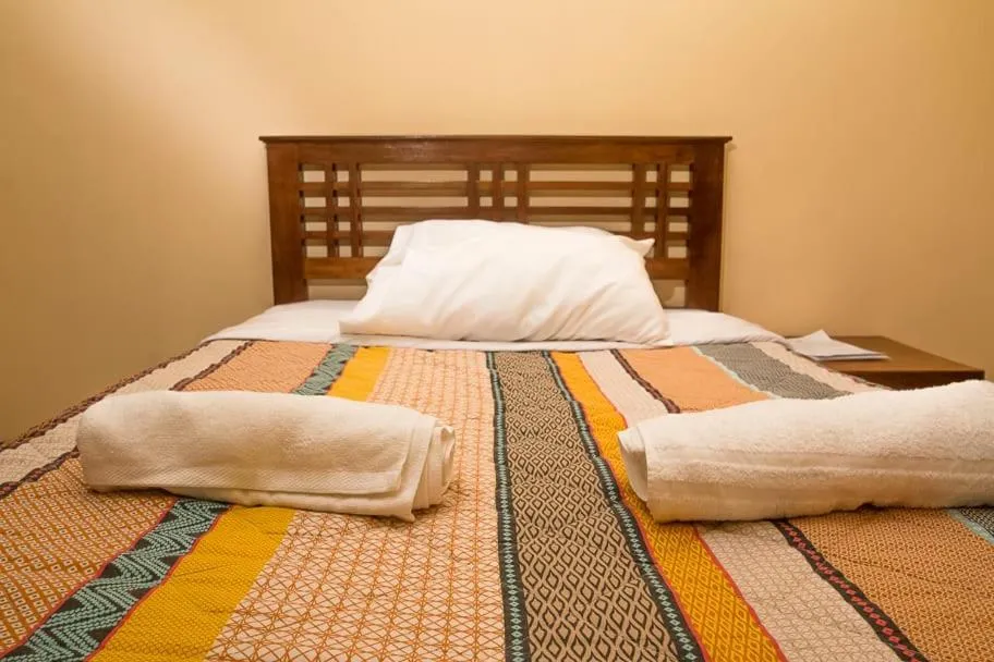 Bed in Lux Suites Le Royal Apartments Nyali