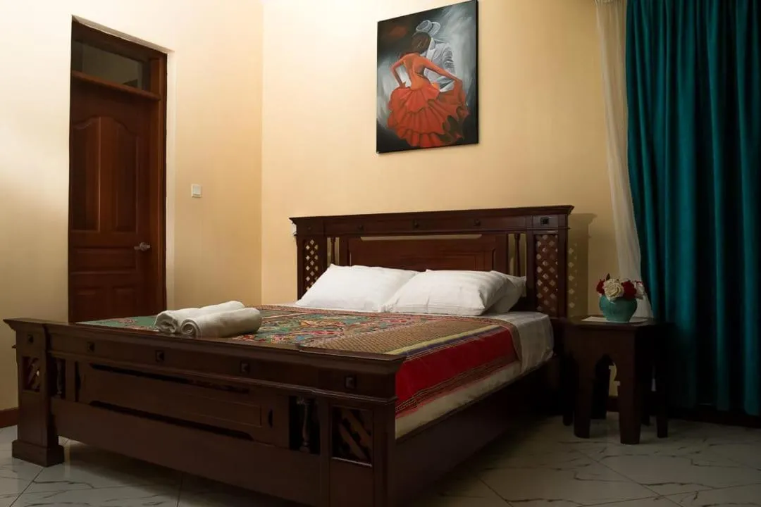 Bed in Lux Suites Le Royal Apartments Nyali