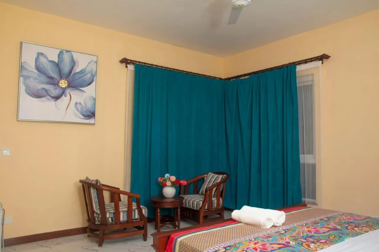 Bed in Lux Suites Le Royal Apartments Nyali