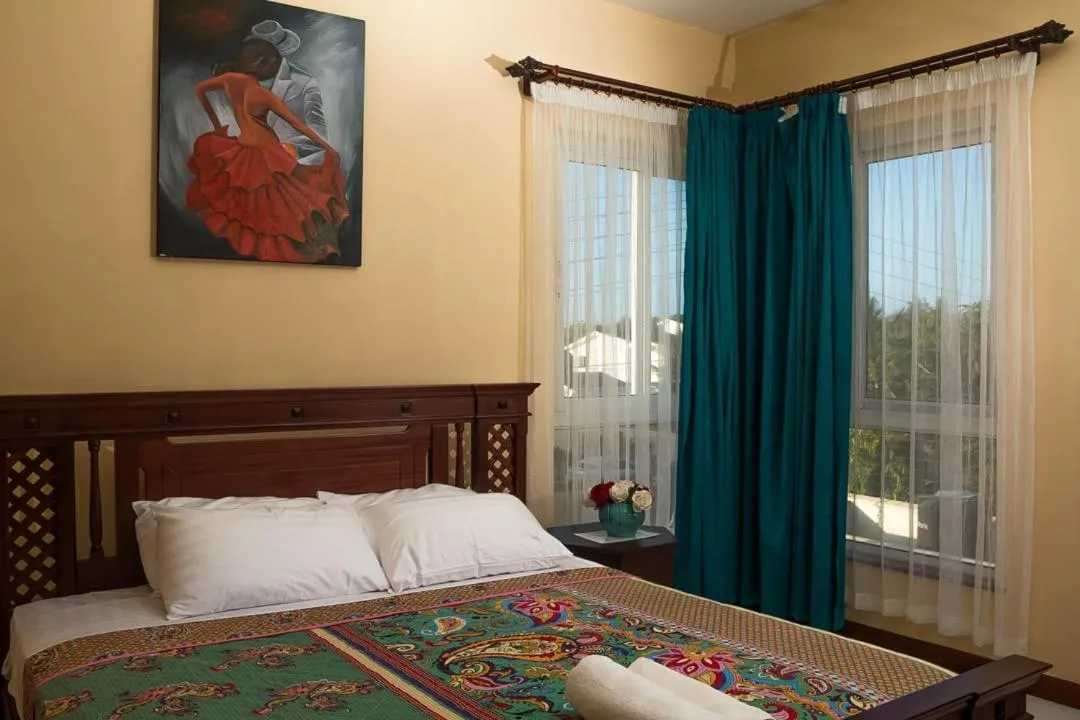 Bed in Lux Suites Le Royal Apartments Nyali