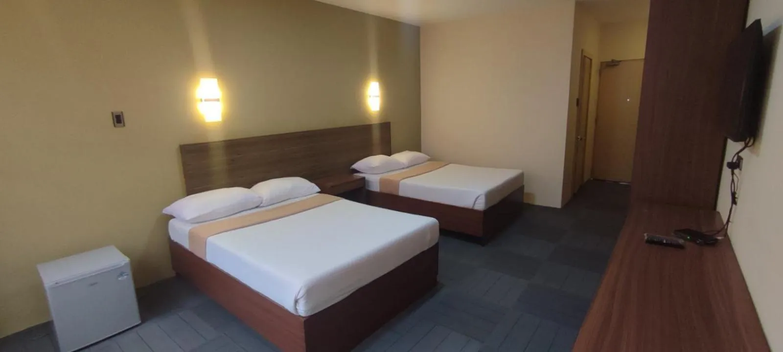 Bed in MADISON PARK HOTEL