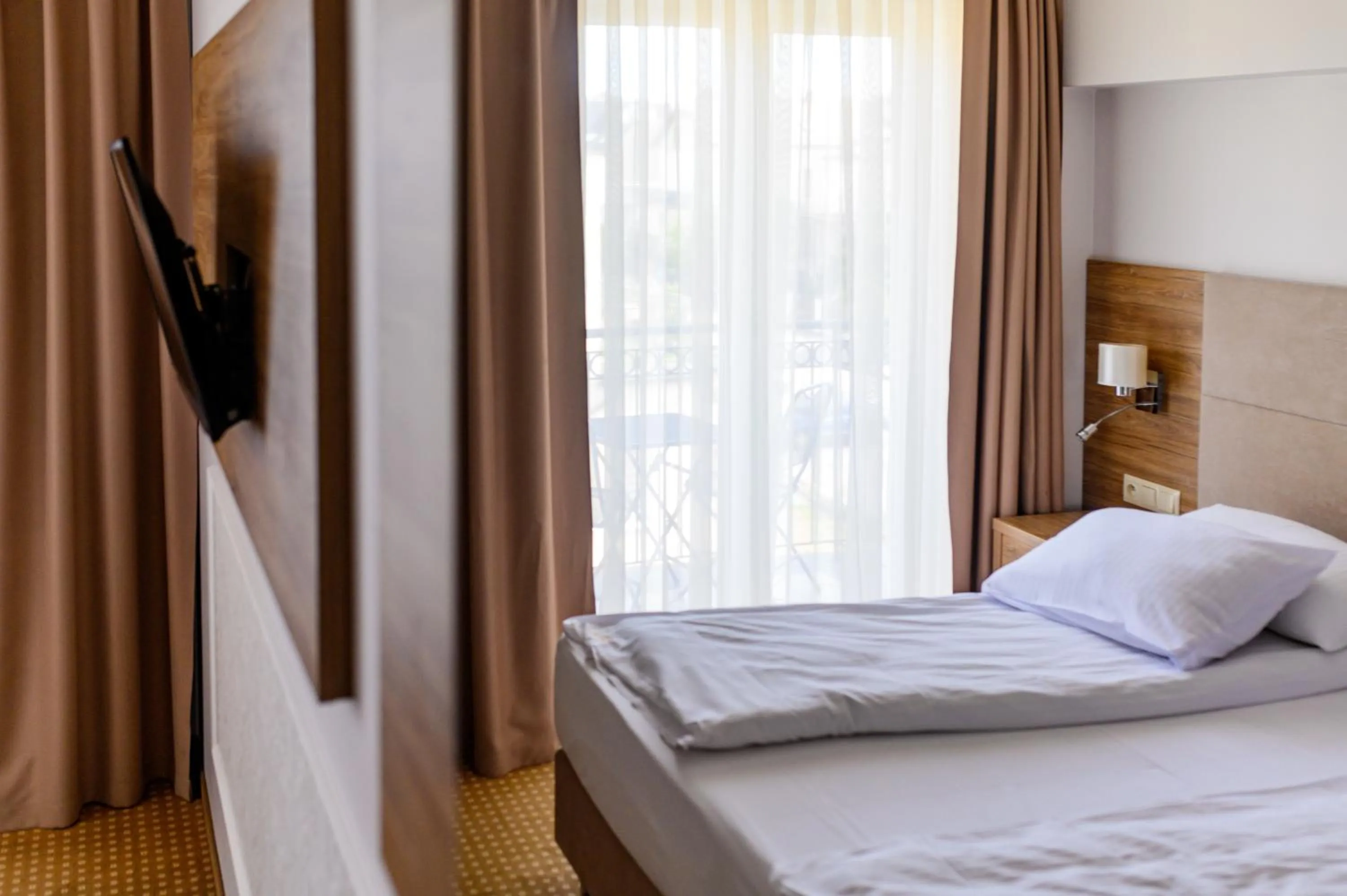 Photo of the whole room, Bed in Moris Boutique Beach Hotel