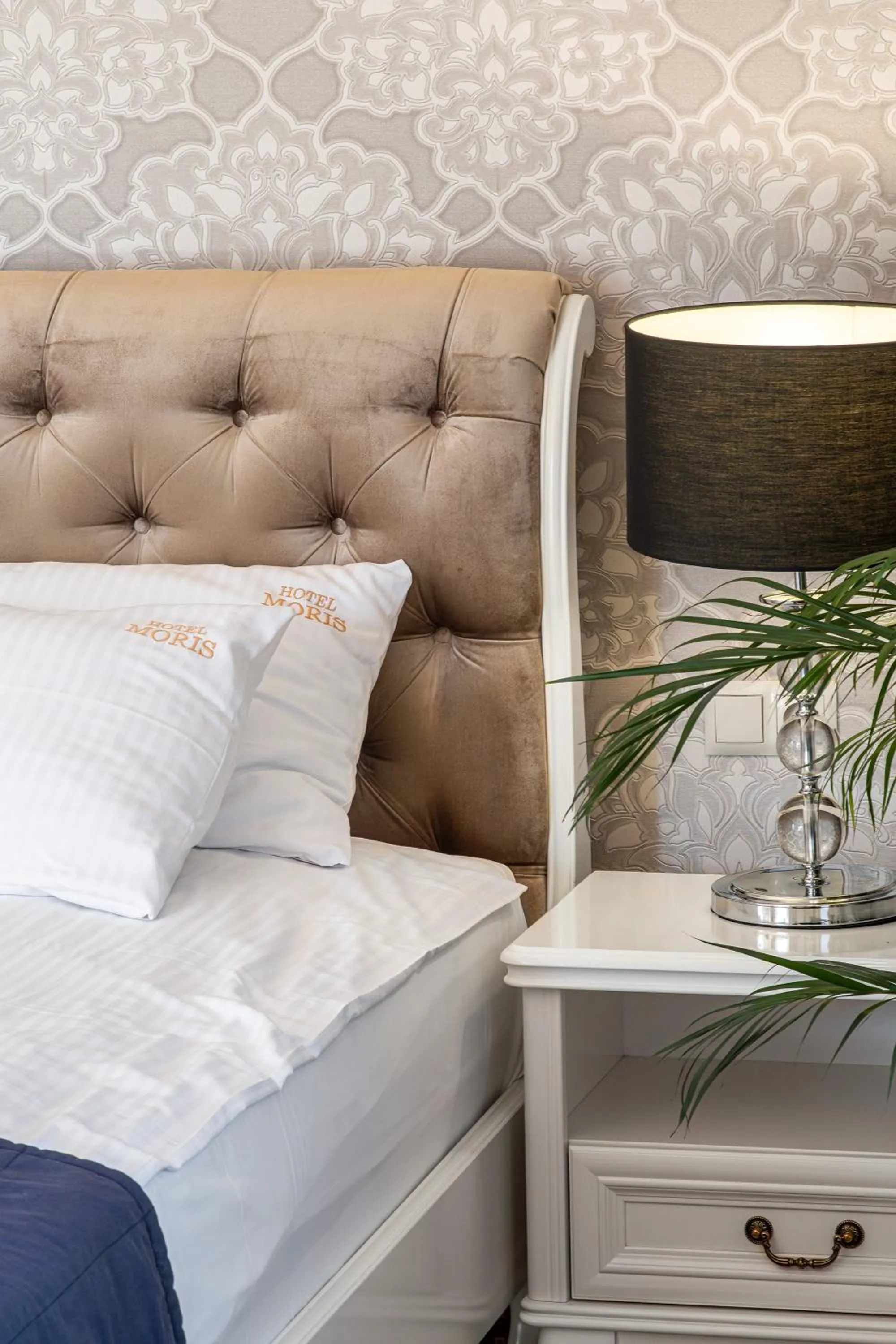 Bed in Moris Boutique Beach Hotel