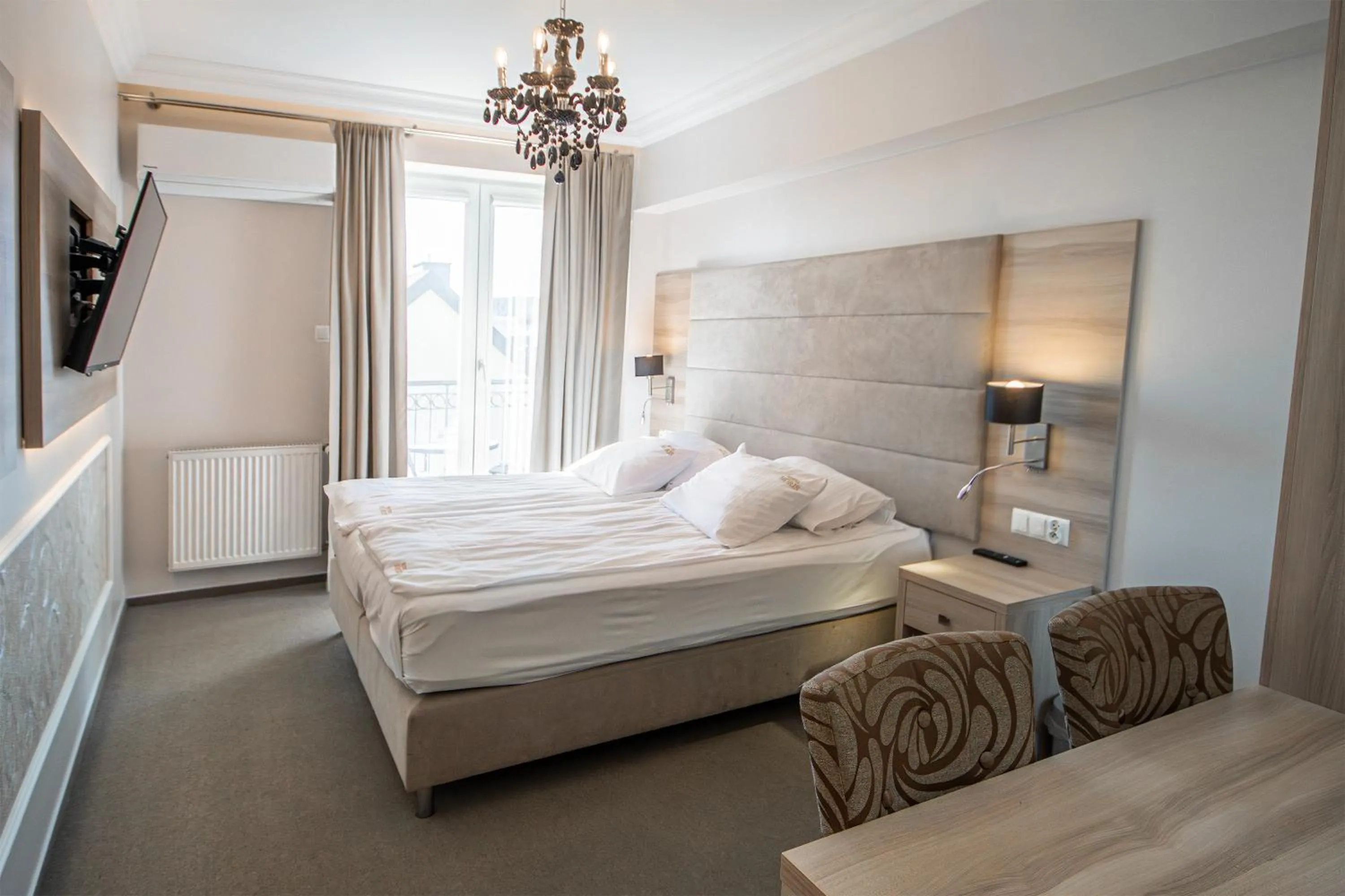 Bed in Moris Boutique Beach Hotel