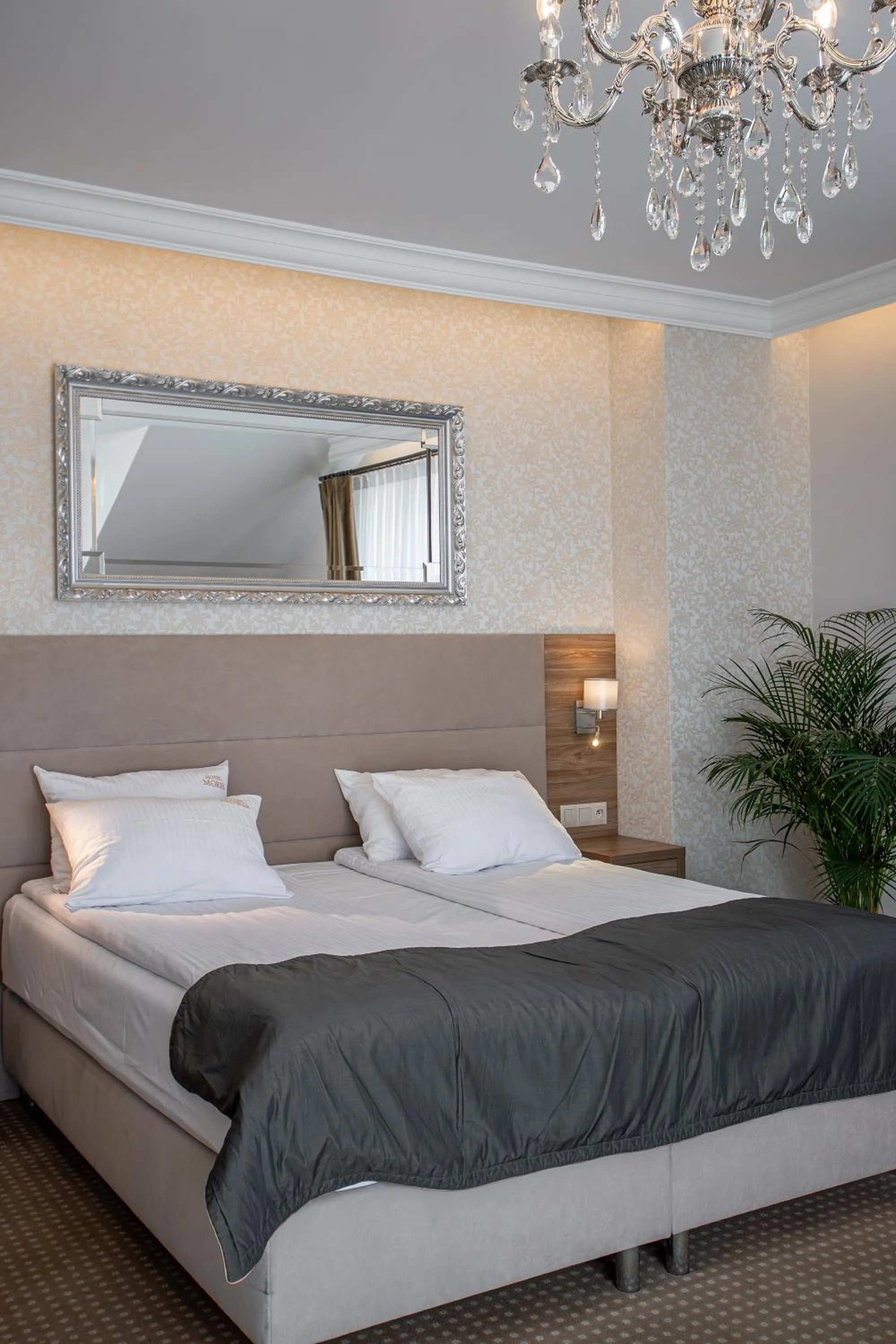 Bed in Moris Boutique Beach Hotel