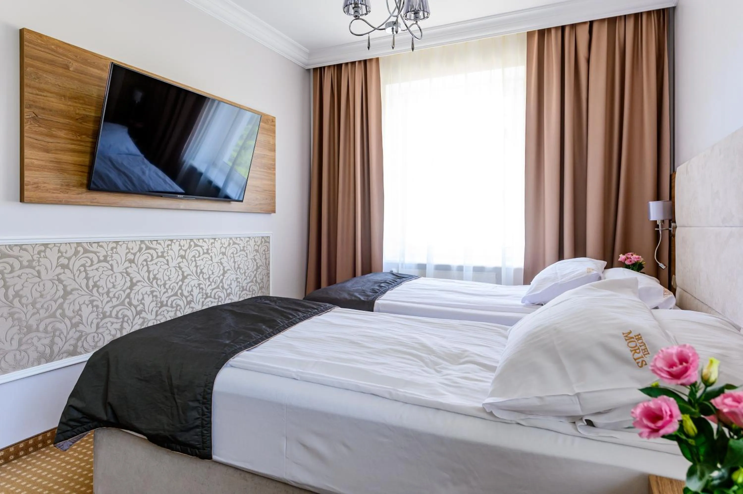 Photo of the whole room, Bed in Moris Boutique Beach Hotel