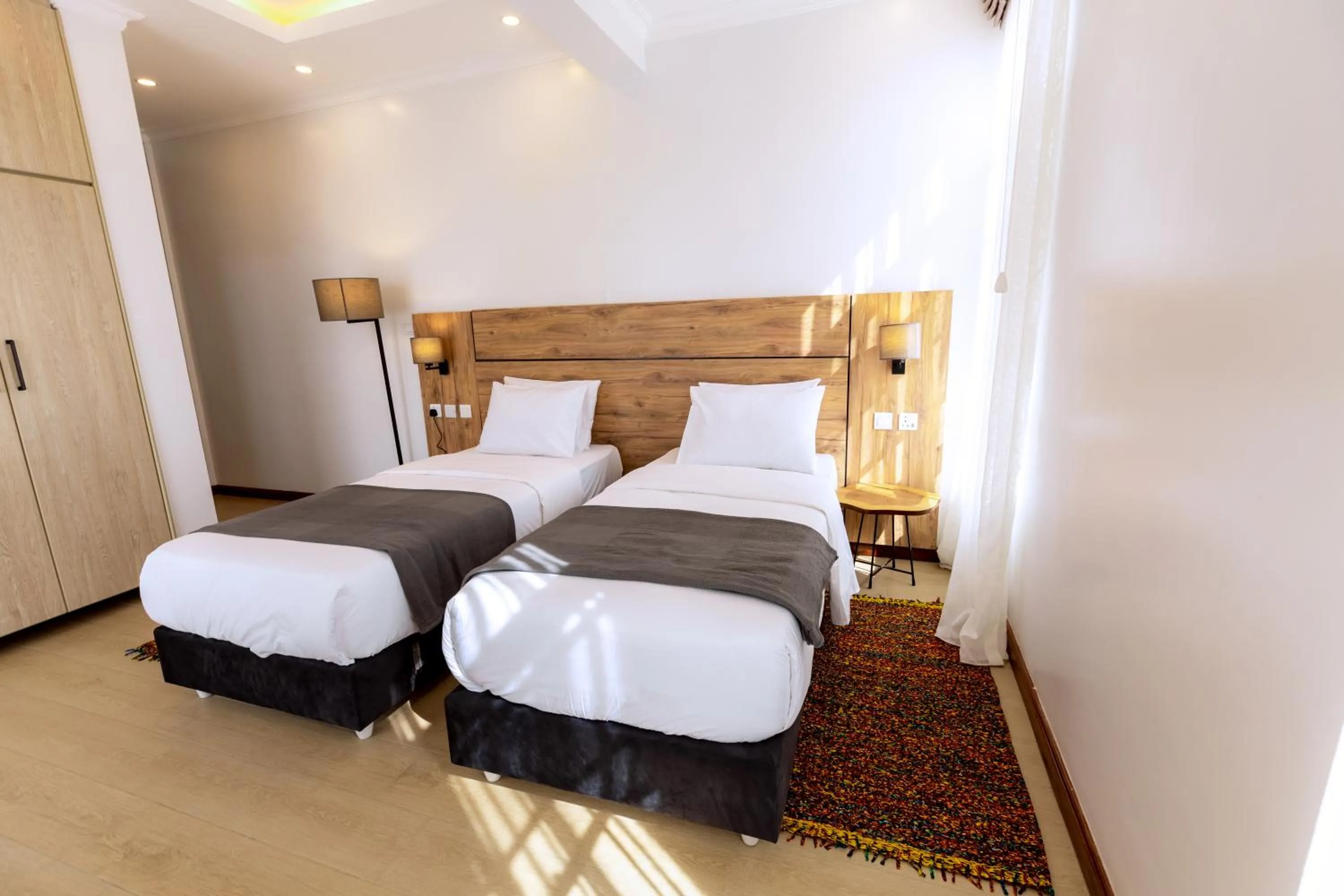 Bed in MAYA Residences Rwanda