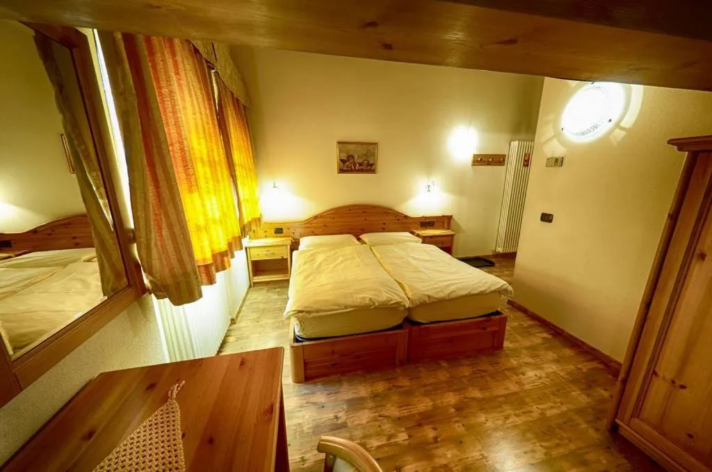 Bed in Garni Baita Cecilia