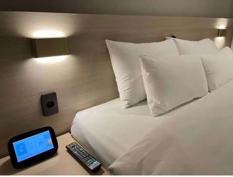 Bed in Hotel SUMMIT