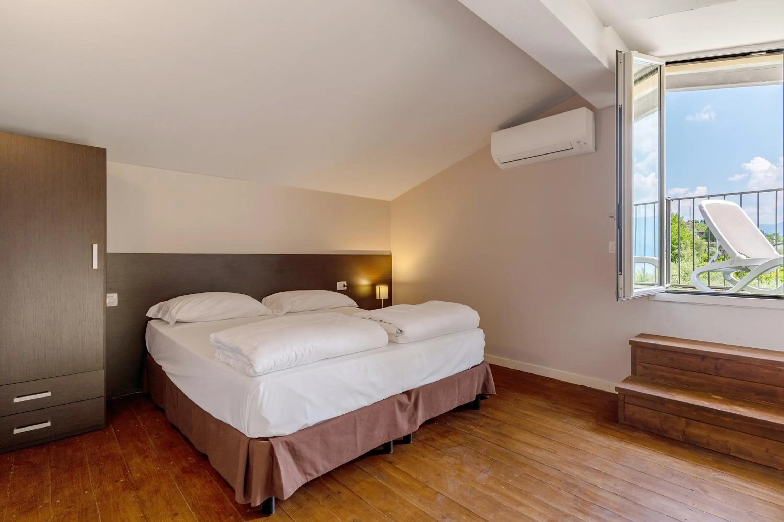 Bedroom, Bed in La Chioma di Berenice Garda Residence