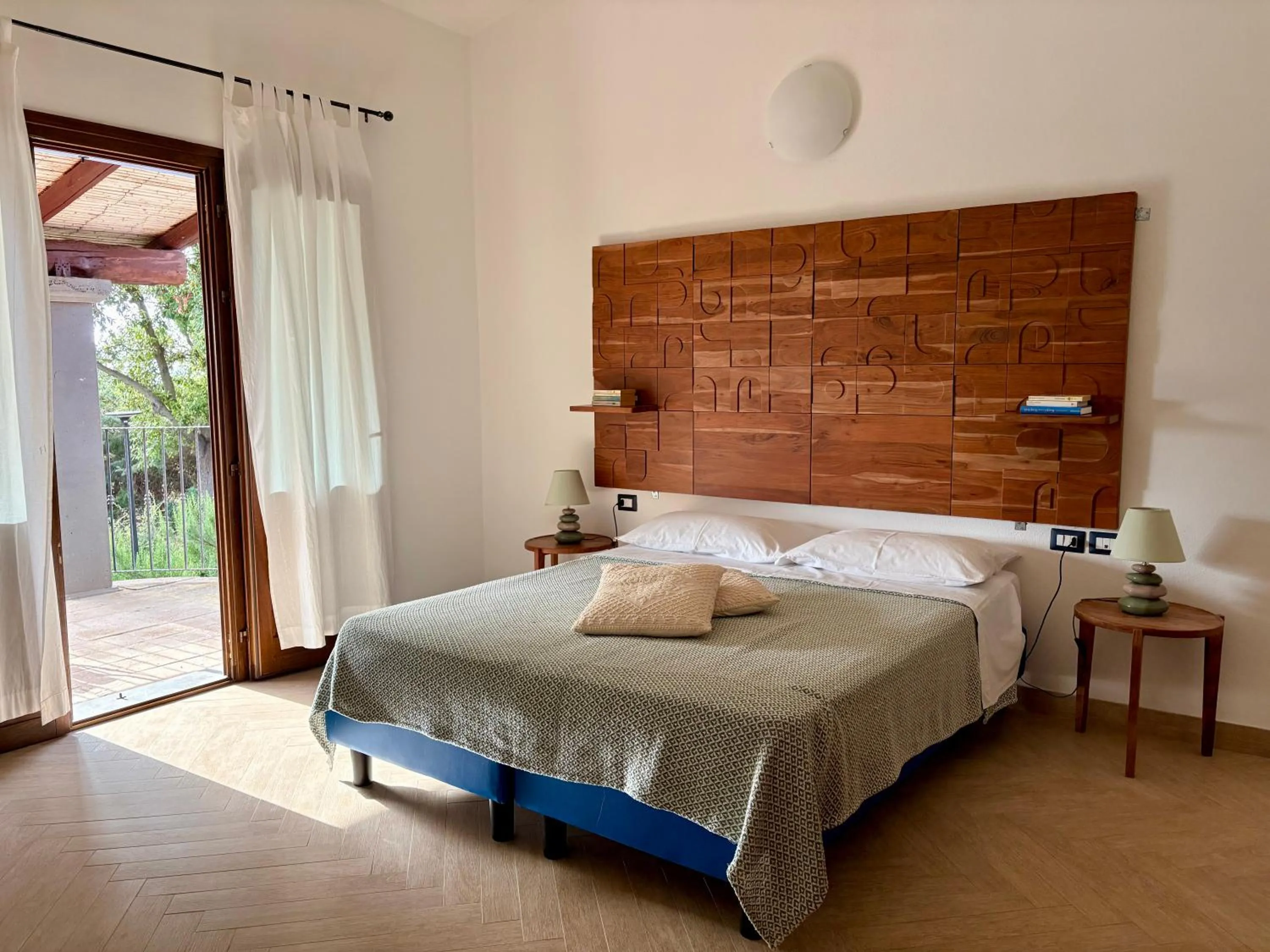 Photo of the whole room, Bed in Lugh'e Luna Village