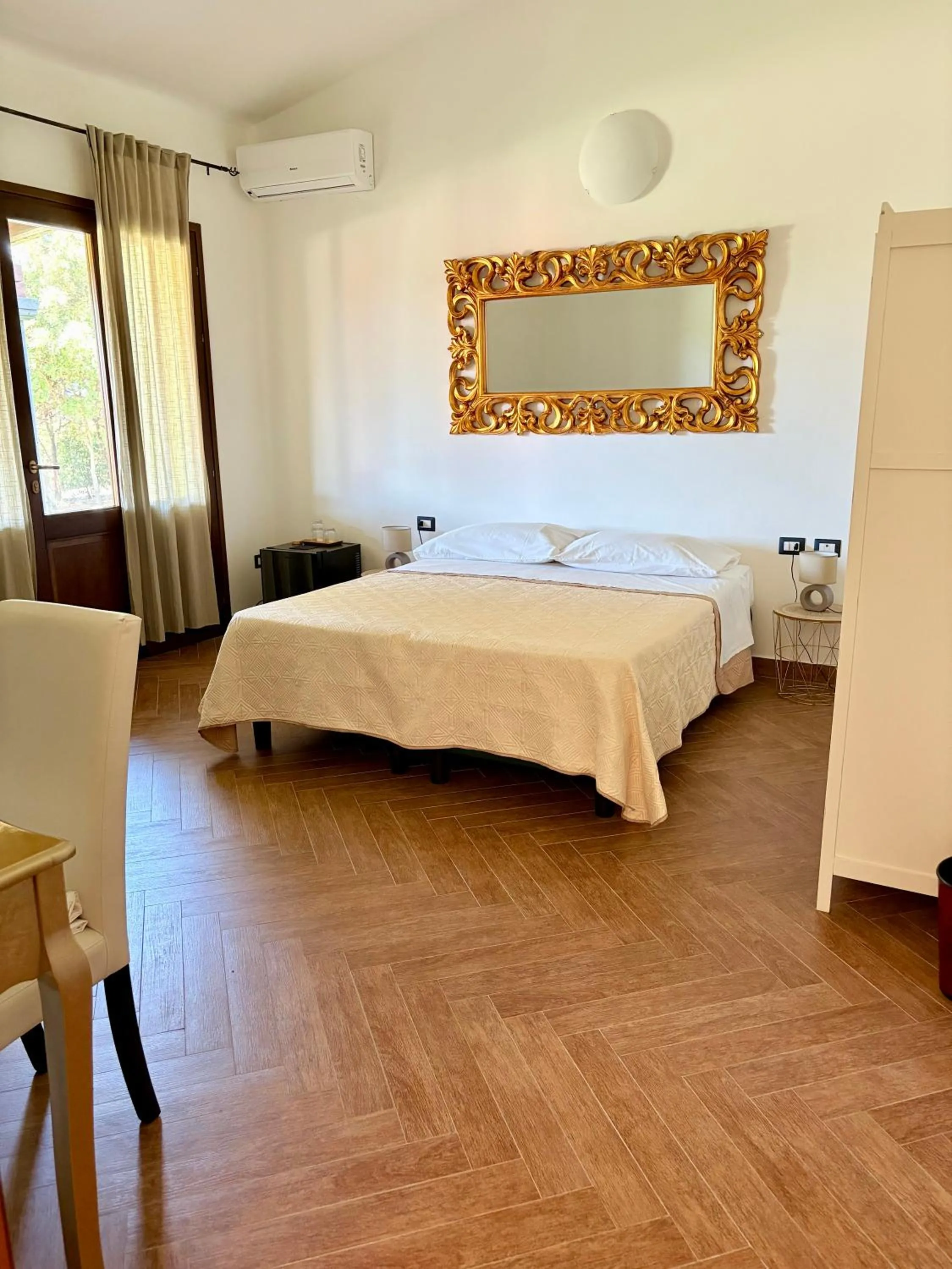 Photo of the whole room, Bed in Lugh'e Luna Village