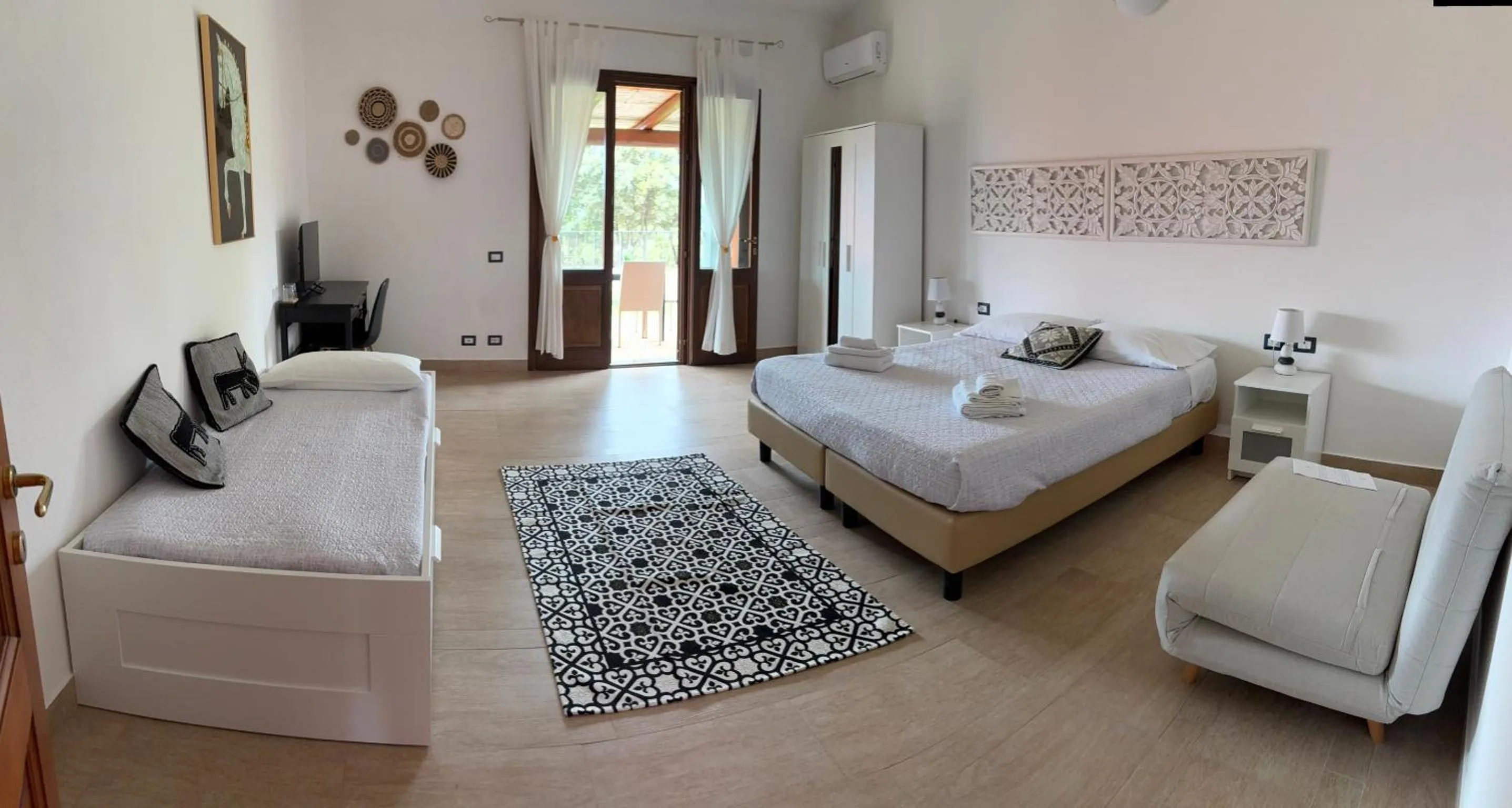 Photo of the whole room, Bed in Lugh'e Luna Village