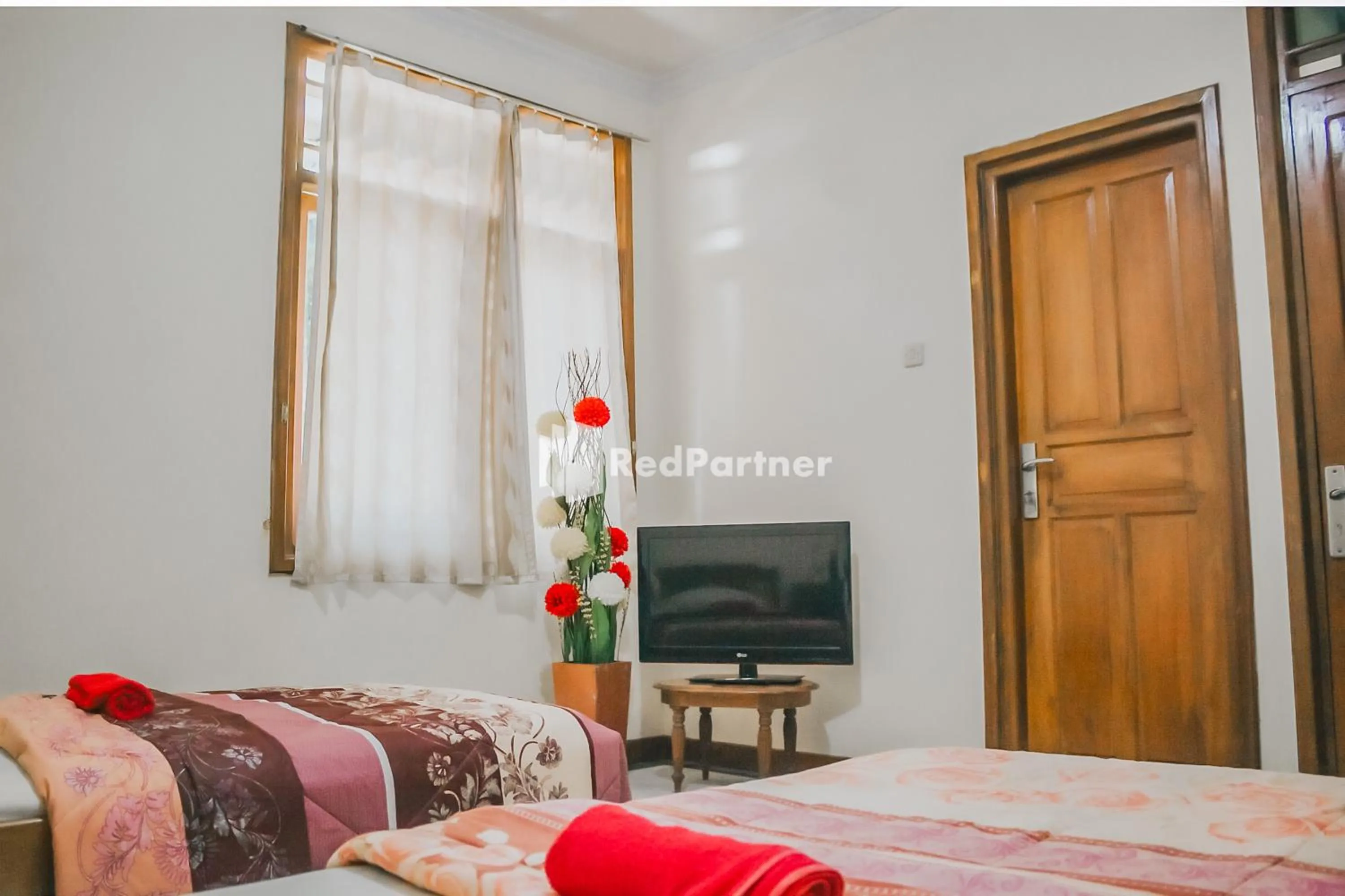 Bedroom, Bed in Villa Mawar Adinda Kuningan Syariah RedPartner