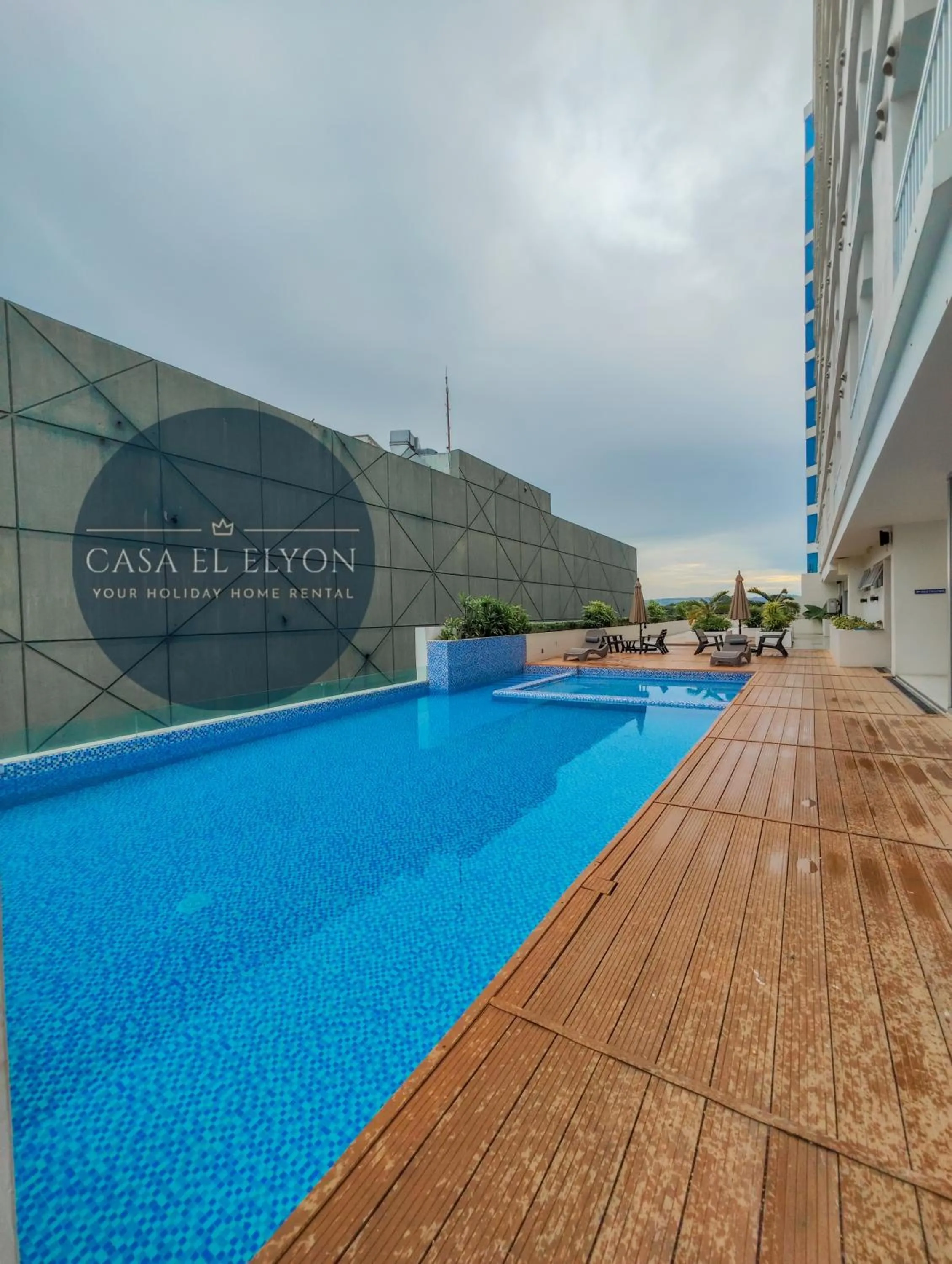 Swimming pool in White Nordic Fully-Furnished Studio at INSPIRIA