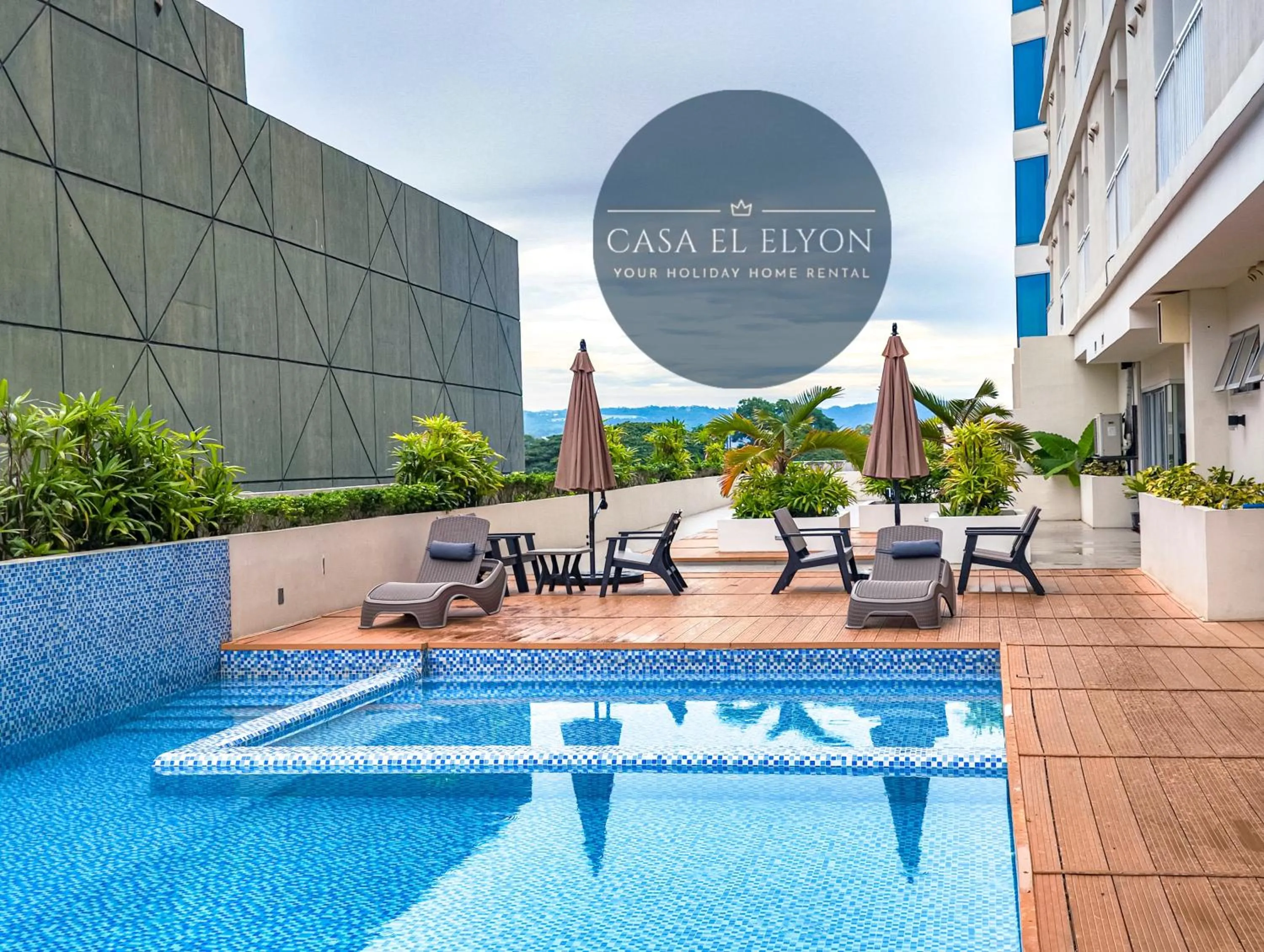 Swimming pool in White Nordic Fully-Furnished Studio at INSPIRIA