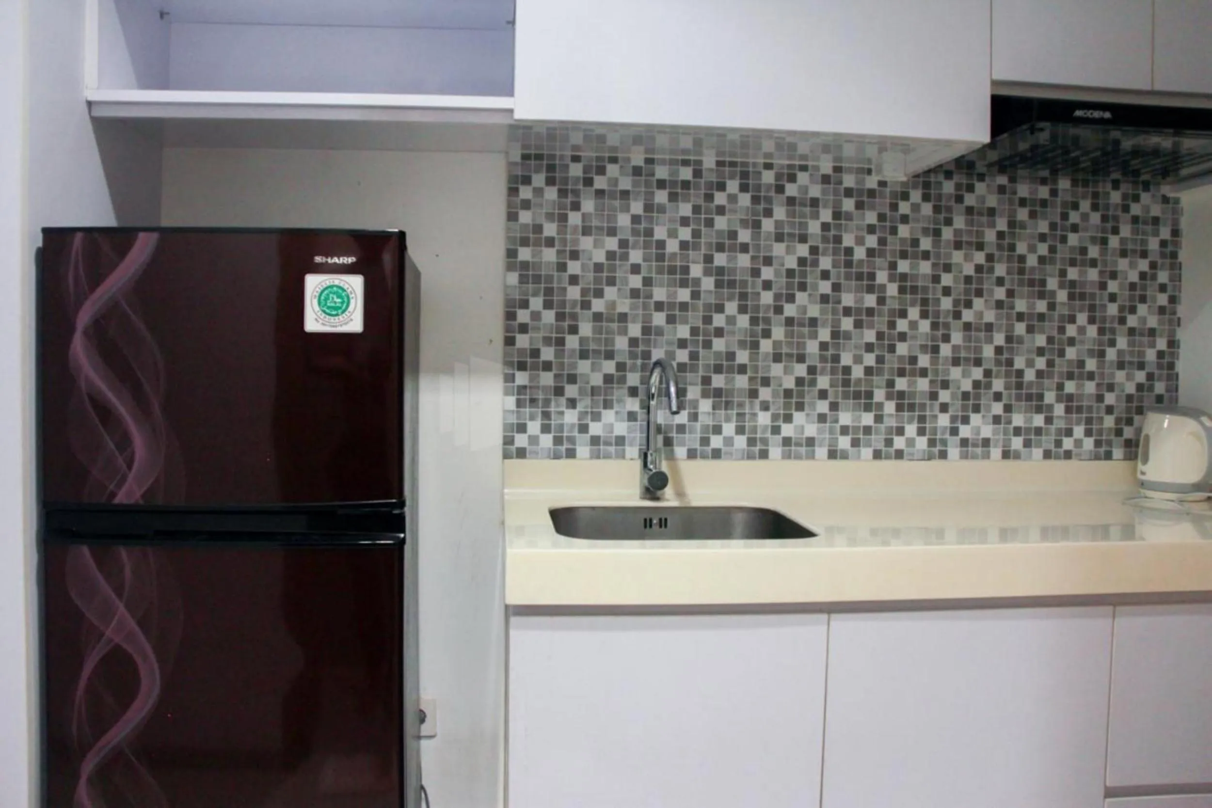 Kitchen or kitchenette in RedLiving Apartemen TreeParkCity - My Rooms Tower Alpine