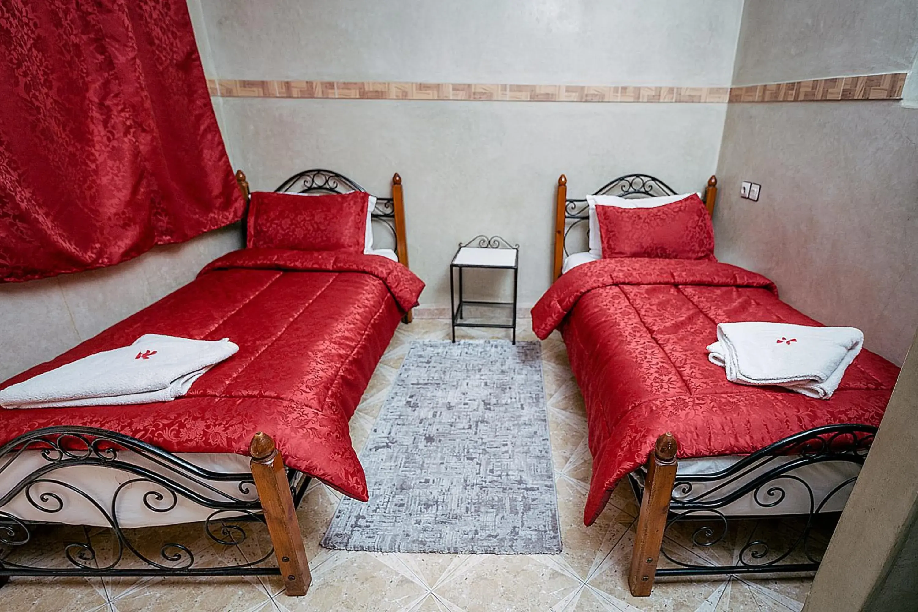 Twin Room with Shared Bathroom in Hôtel Faouzi Twin Room with Shared Bathroom in Hôtel Faouzi