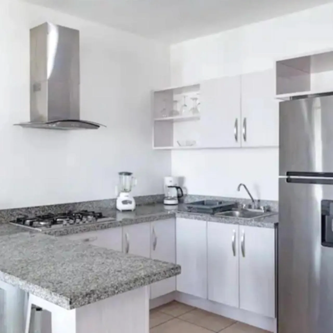 Kitchen or kitchenette in Apartamento Vacacional con Piscina en Puerto Vallarta