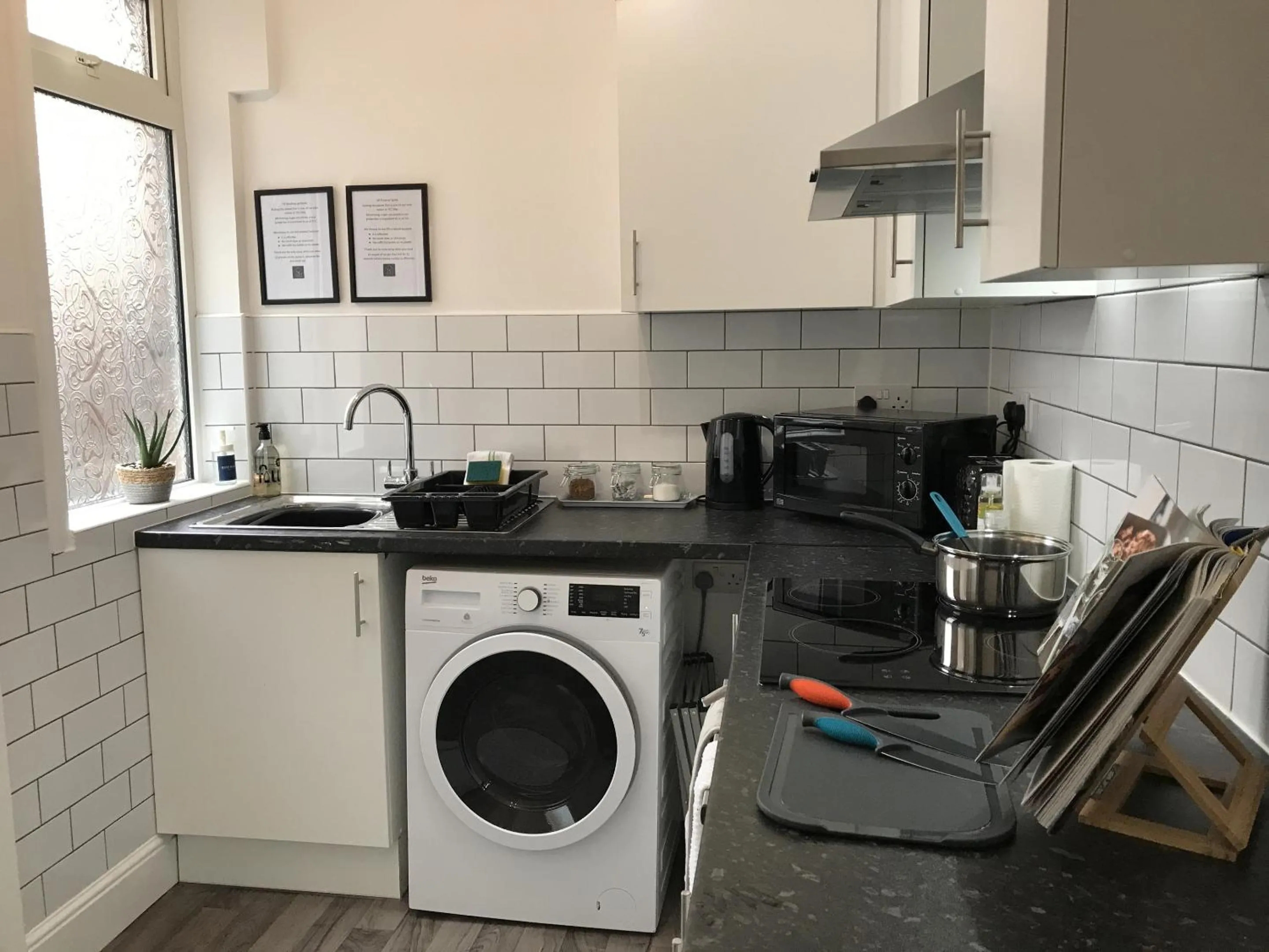 Kitchen or kitchenette in Bright Spacious 3-bed with office & patio, Preston