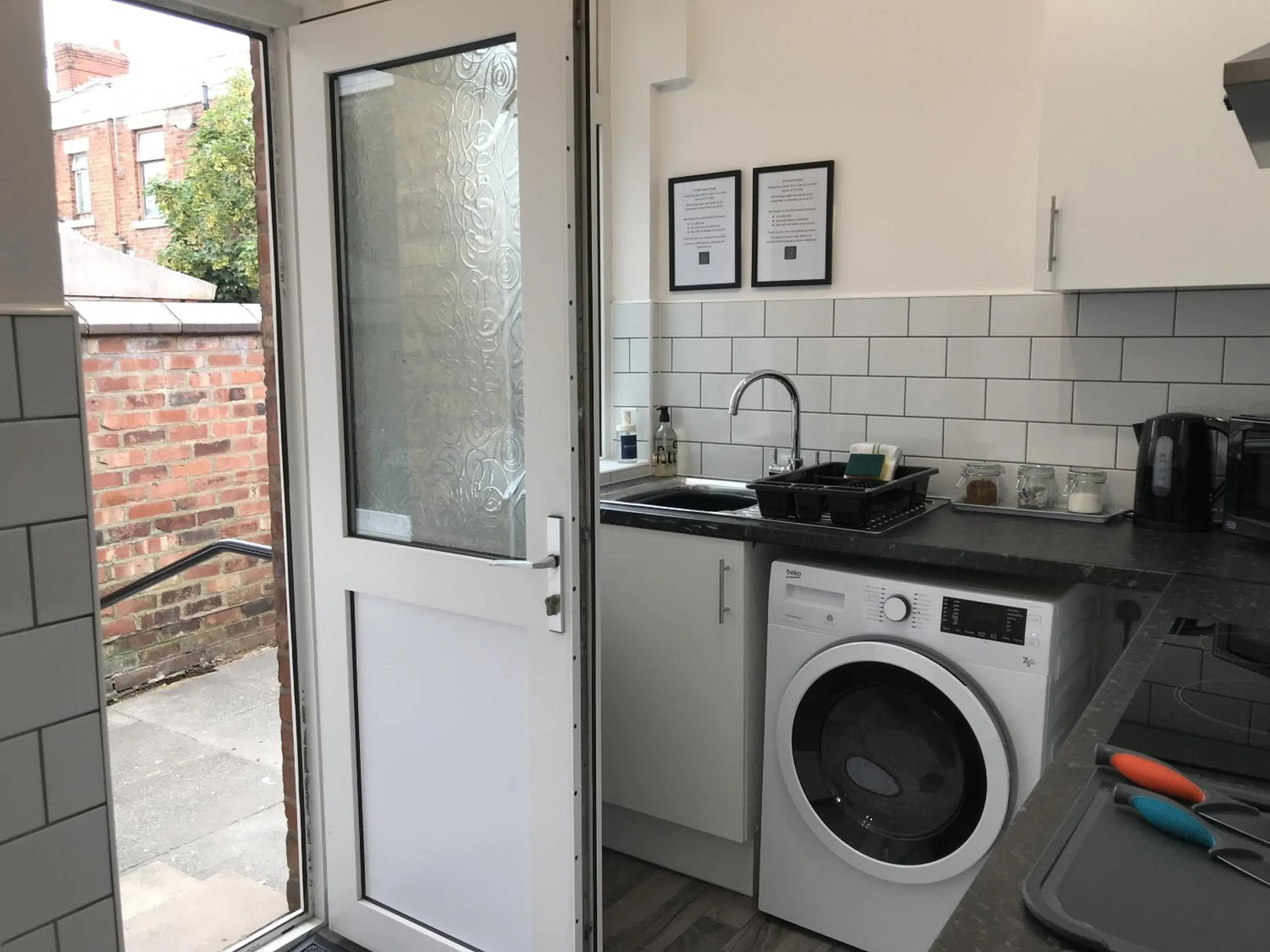 Kitchen or kitchenette in Bright Spacious 3-bed with office & patio, Preston