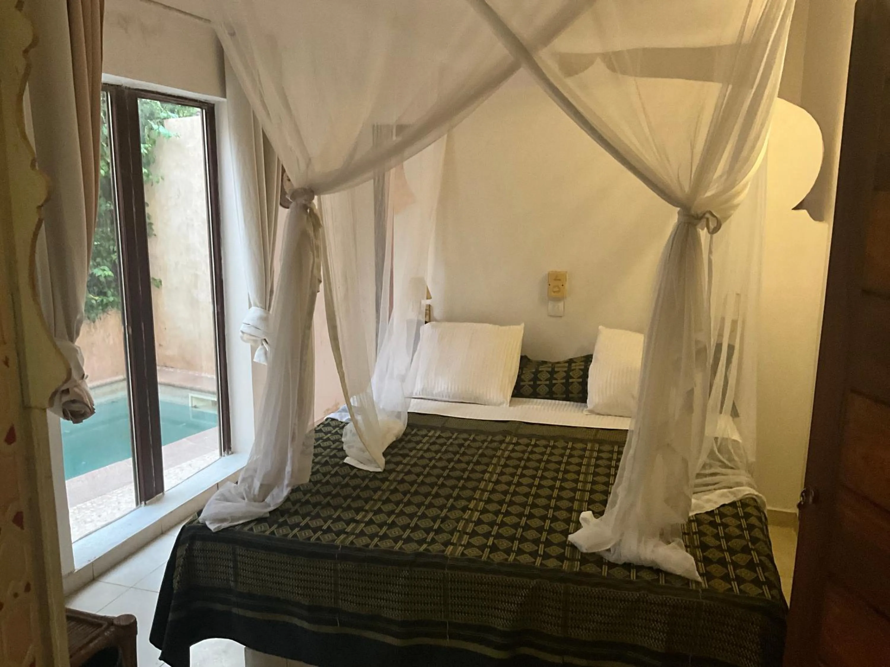 Bed in HOTEL Le Clos Des Papillons