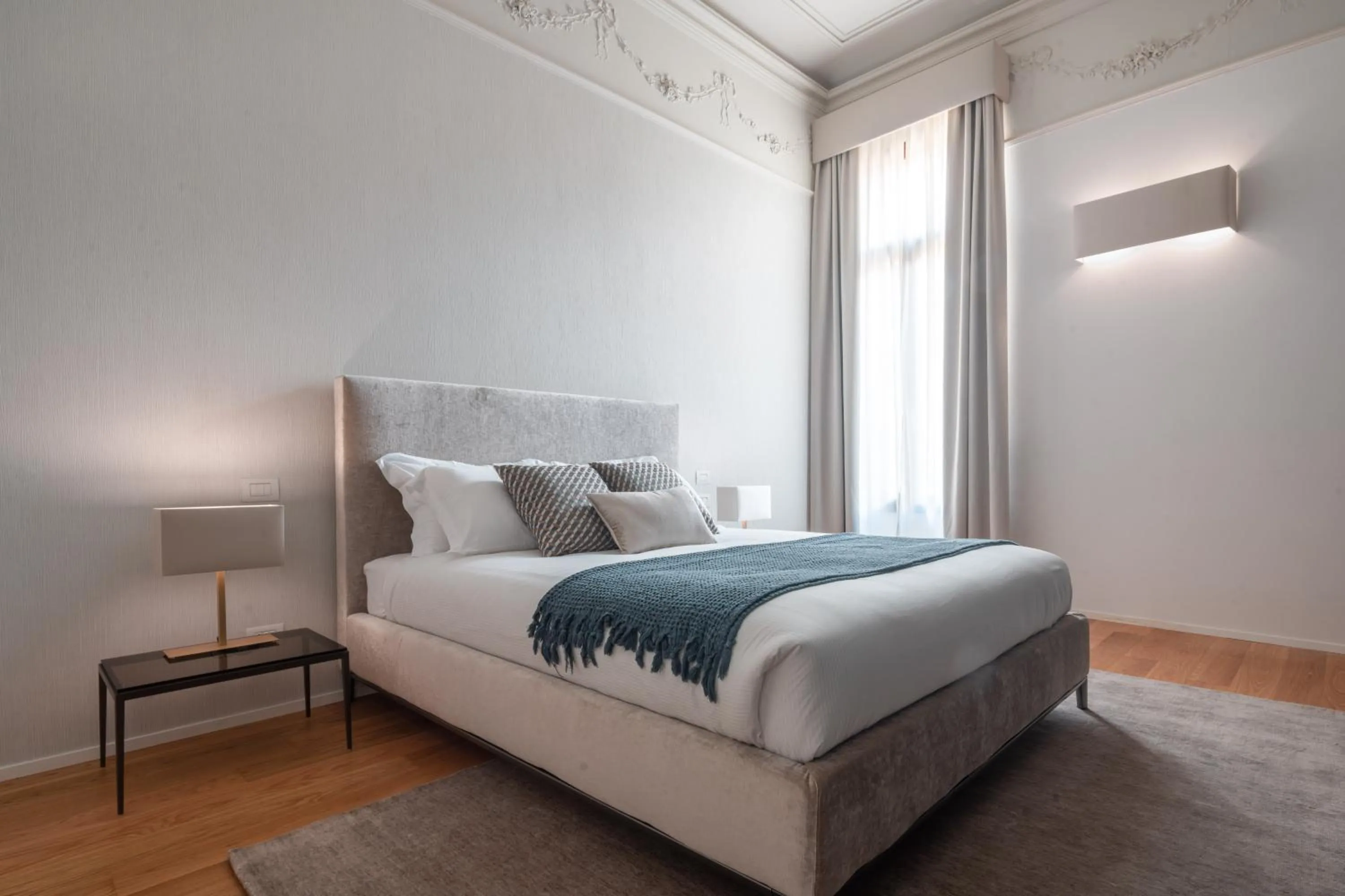 Bed in Ninfea Luxury Suites