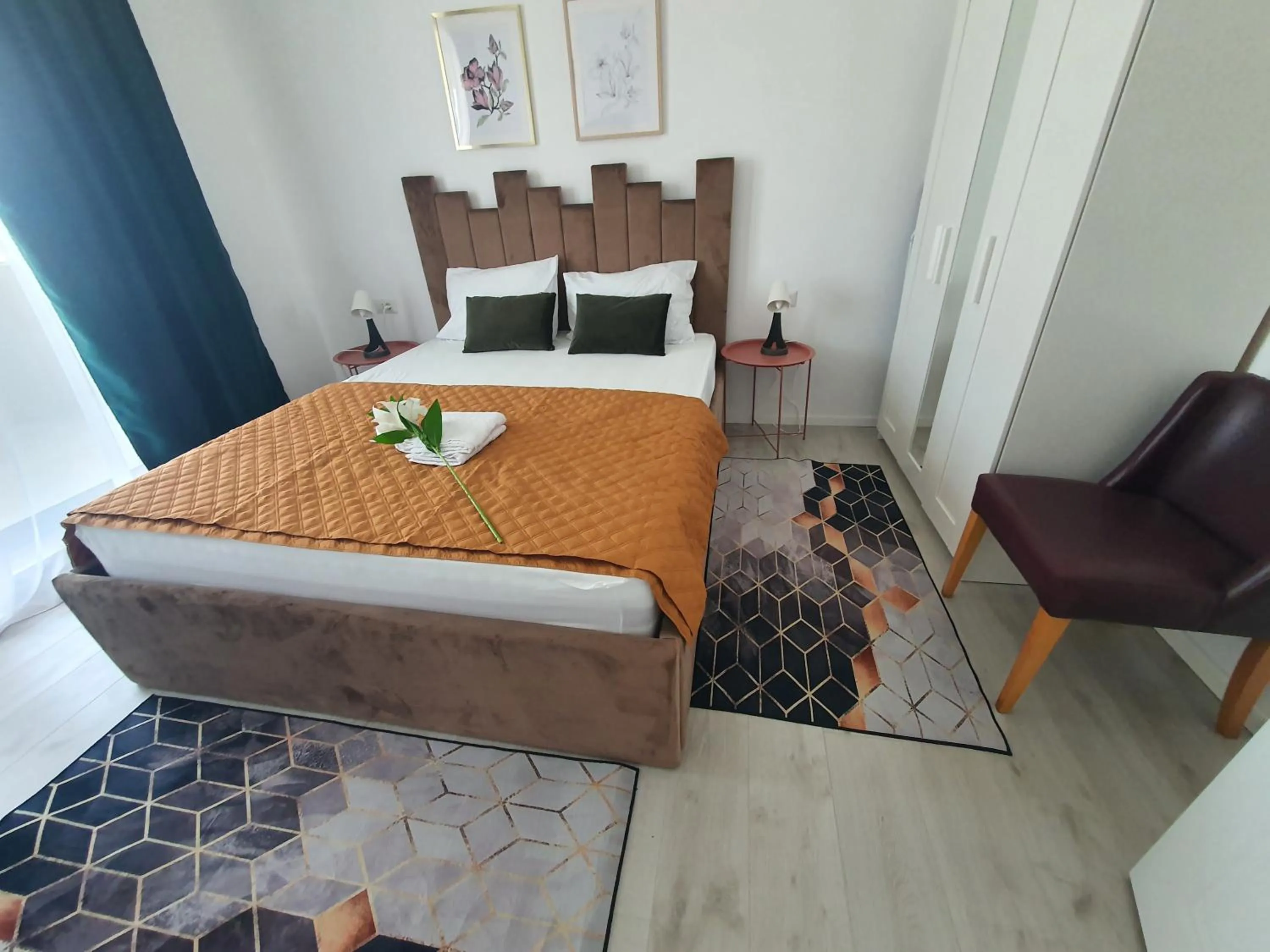 Bed in Grey Residence Apartments