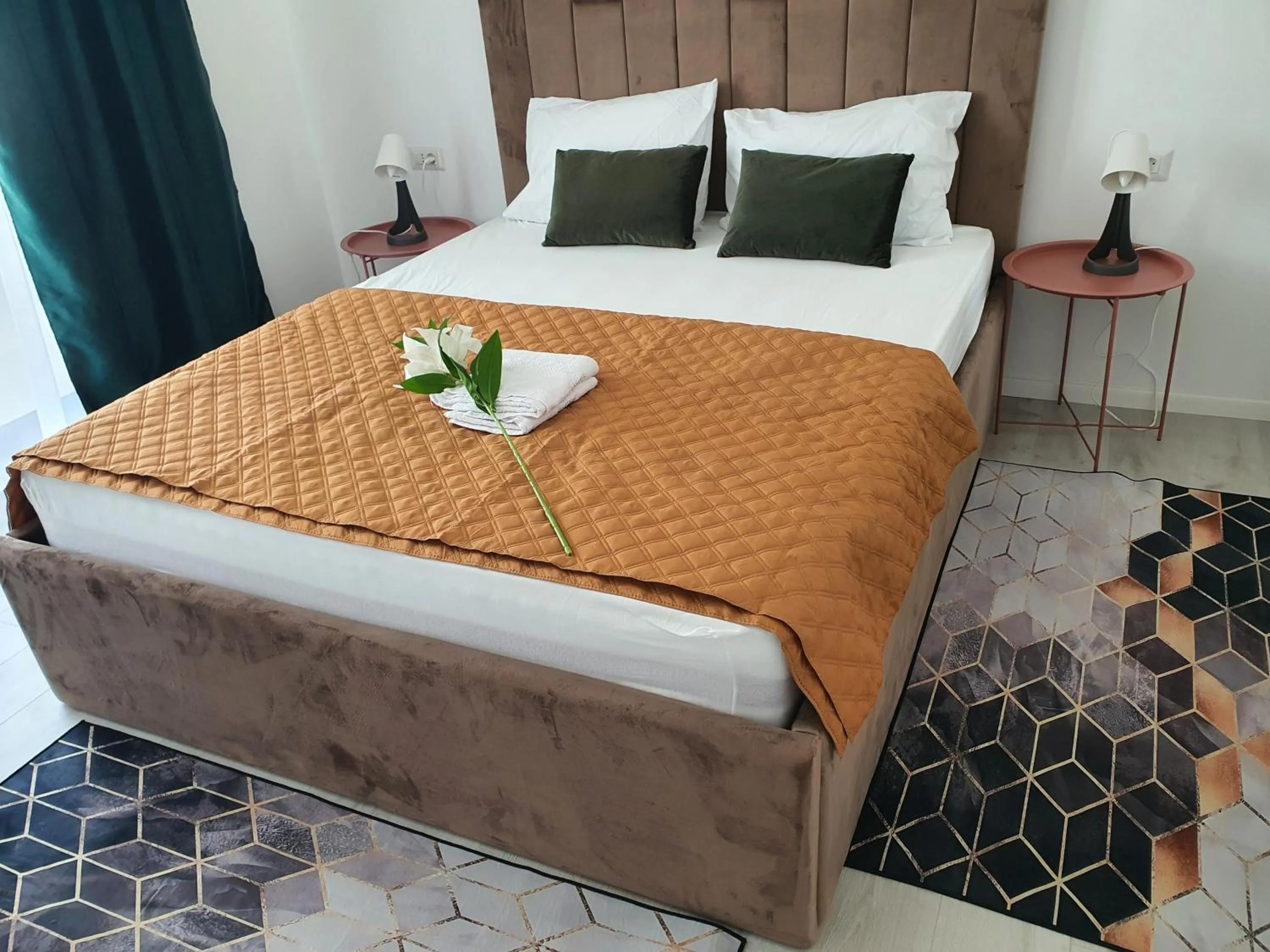 Bed in Grey Residence Apartments