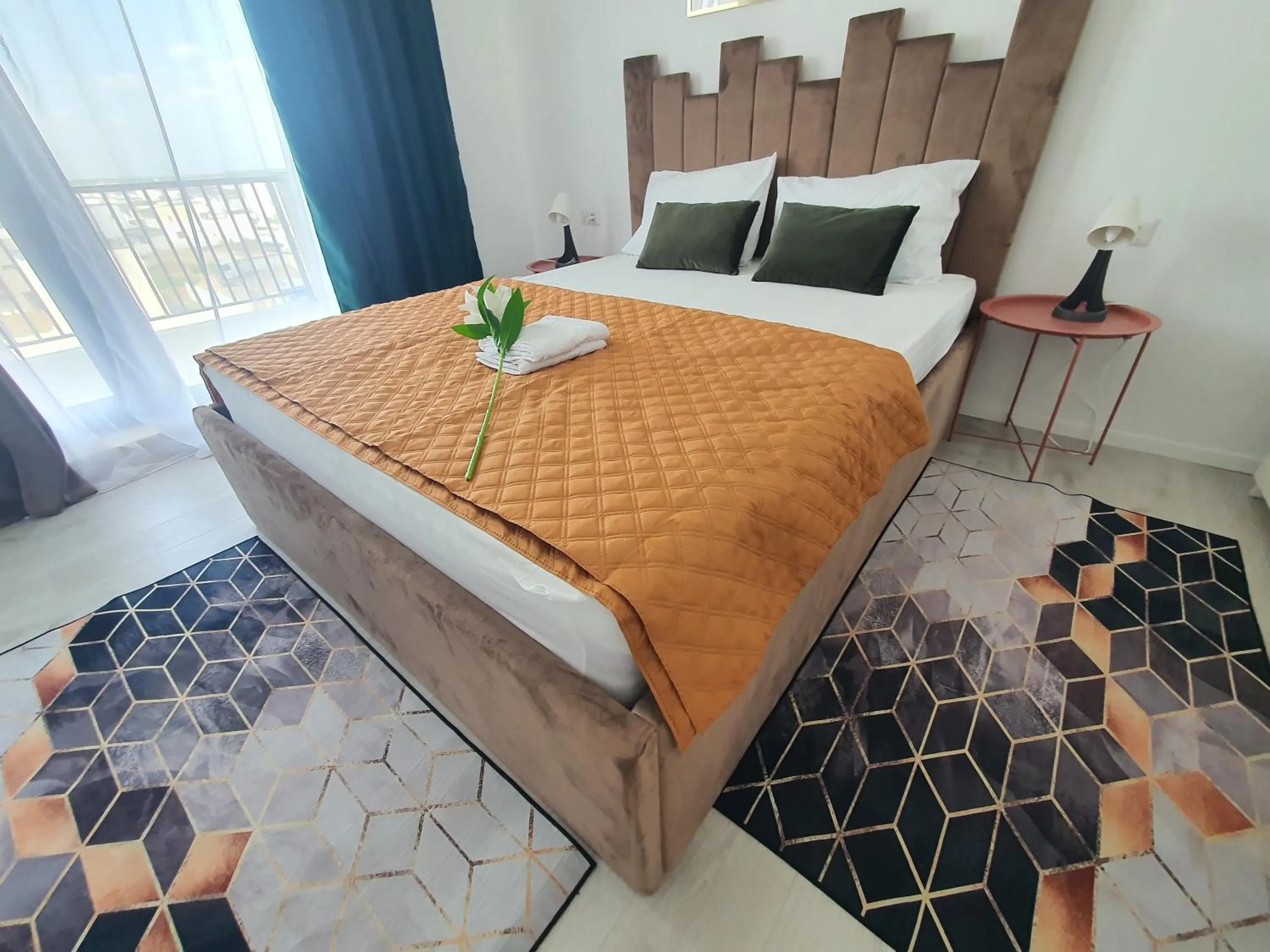 Bed in Grey Residence Apartments