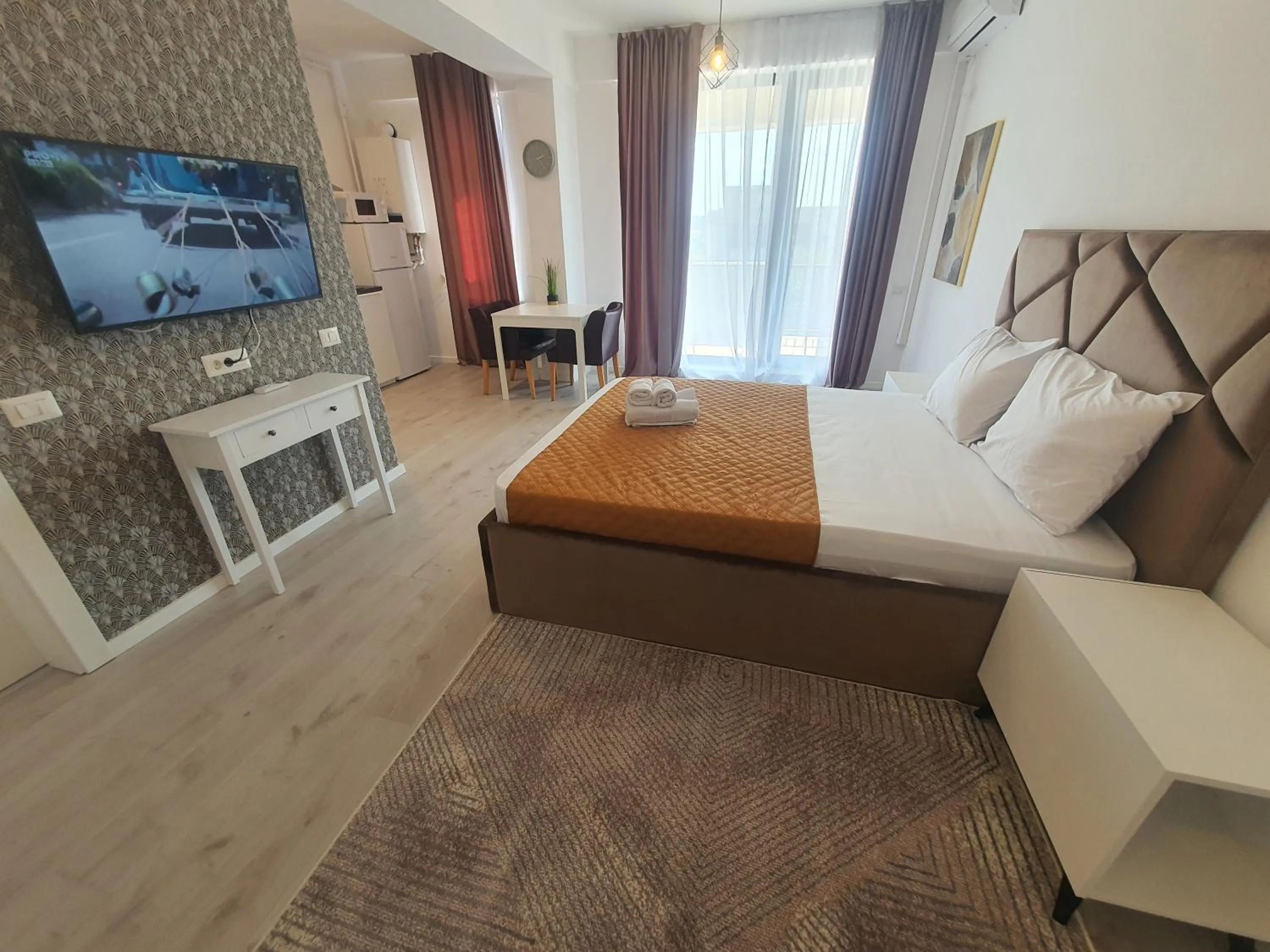 TV and multimedia, Bed in Grey Residence Apartments