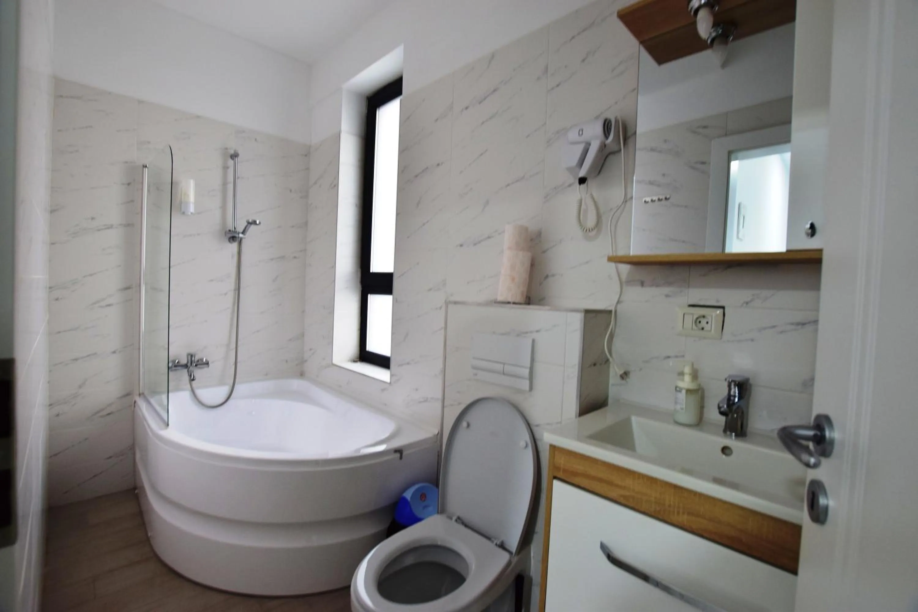 Bathroom in Grey Residence Apartments