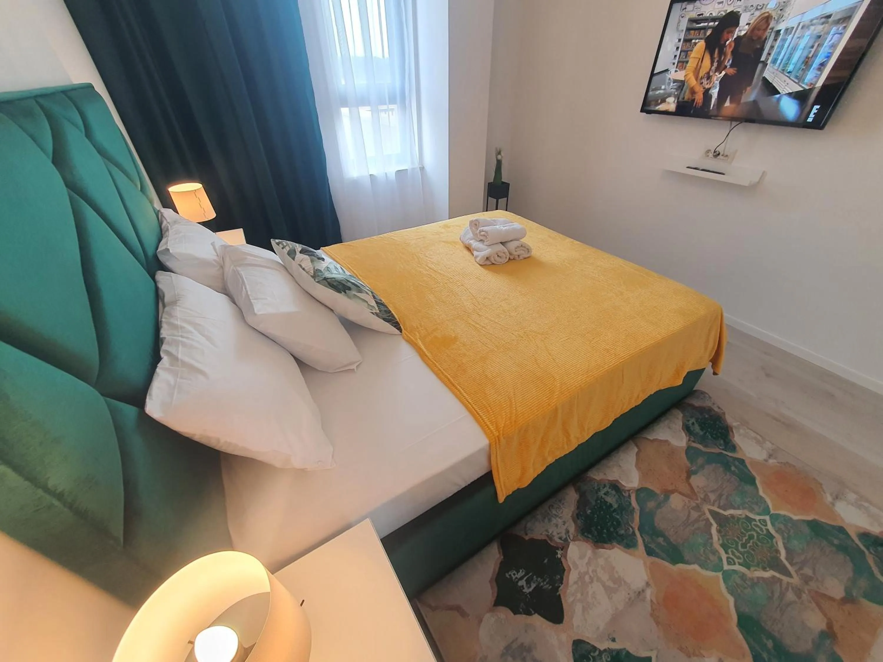 TV and multimedia, Bed in Grey Residence Apartments