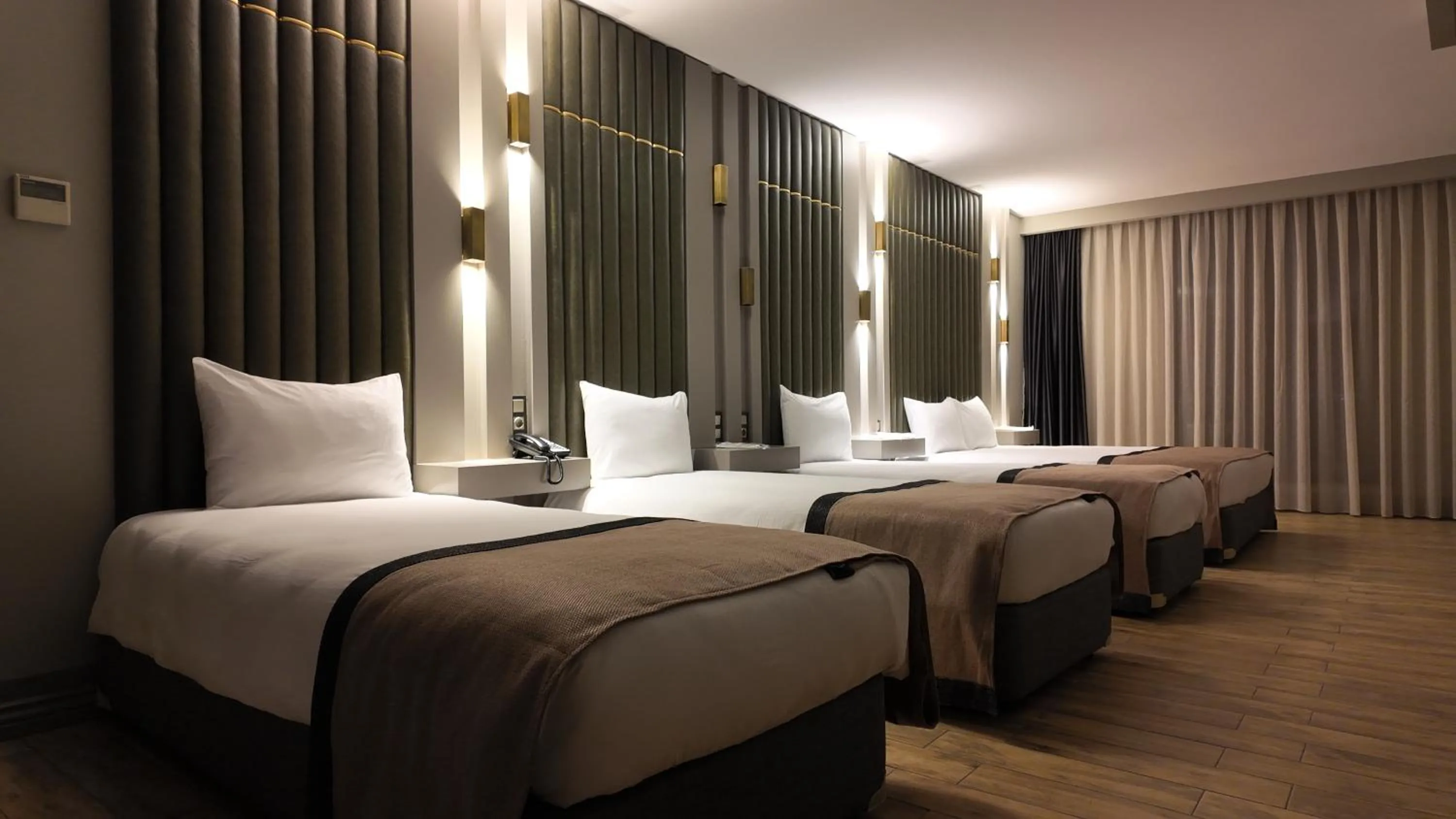 Bed in Lala Grand Hotel