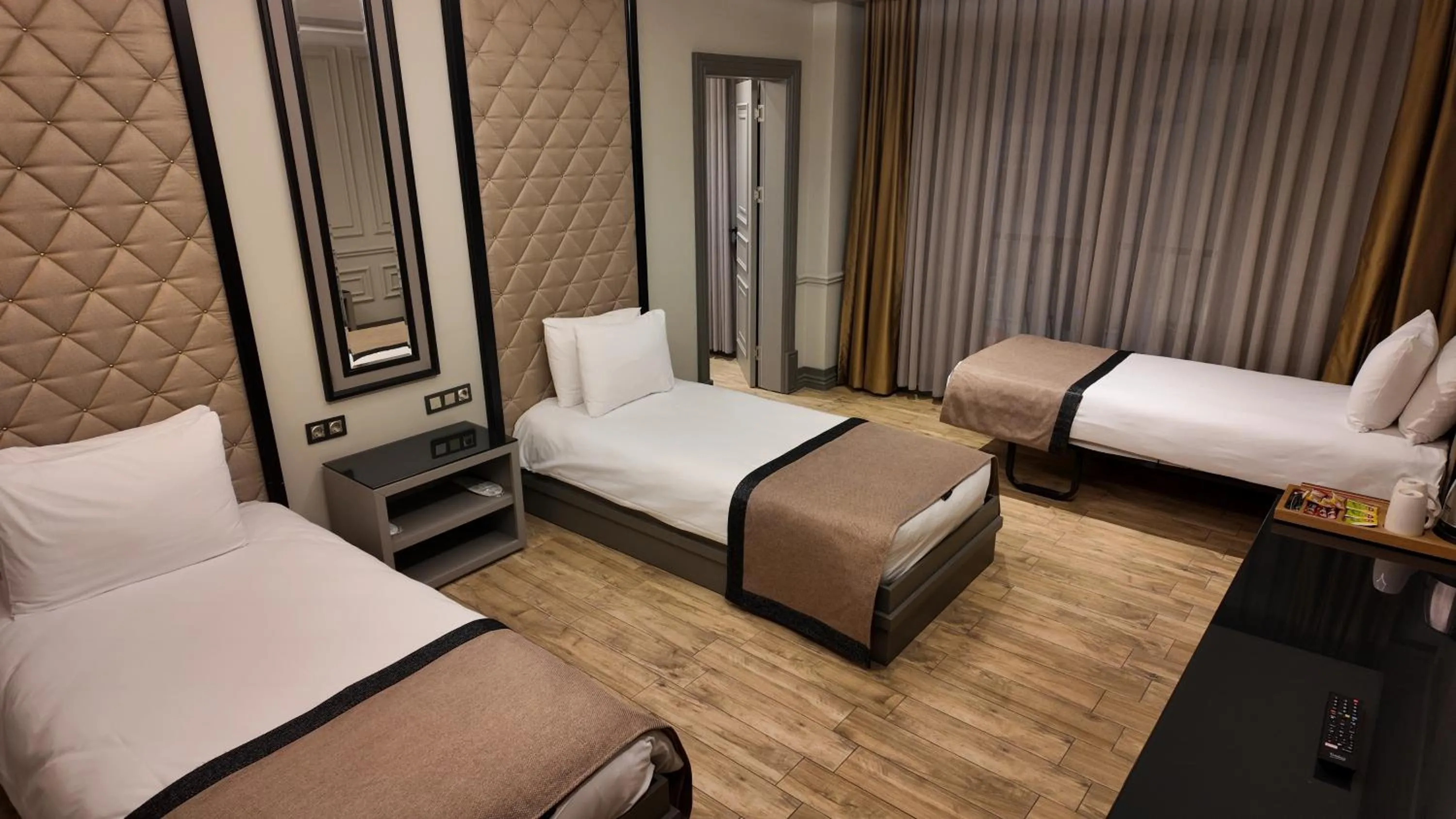 Bed in Lala Grand Hotel