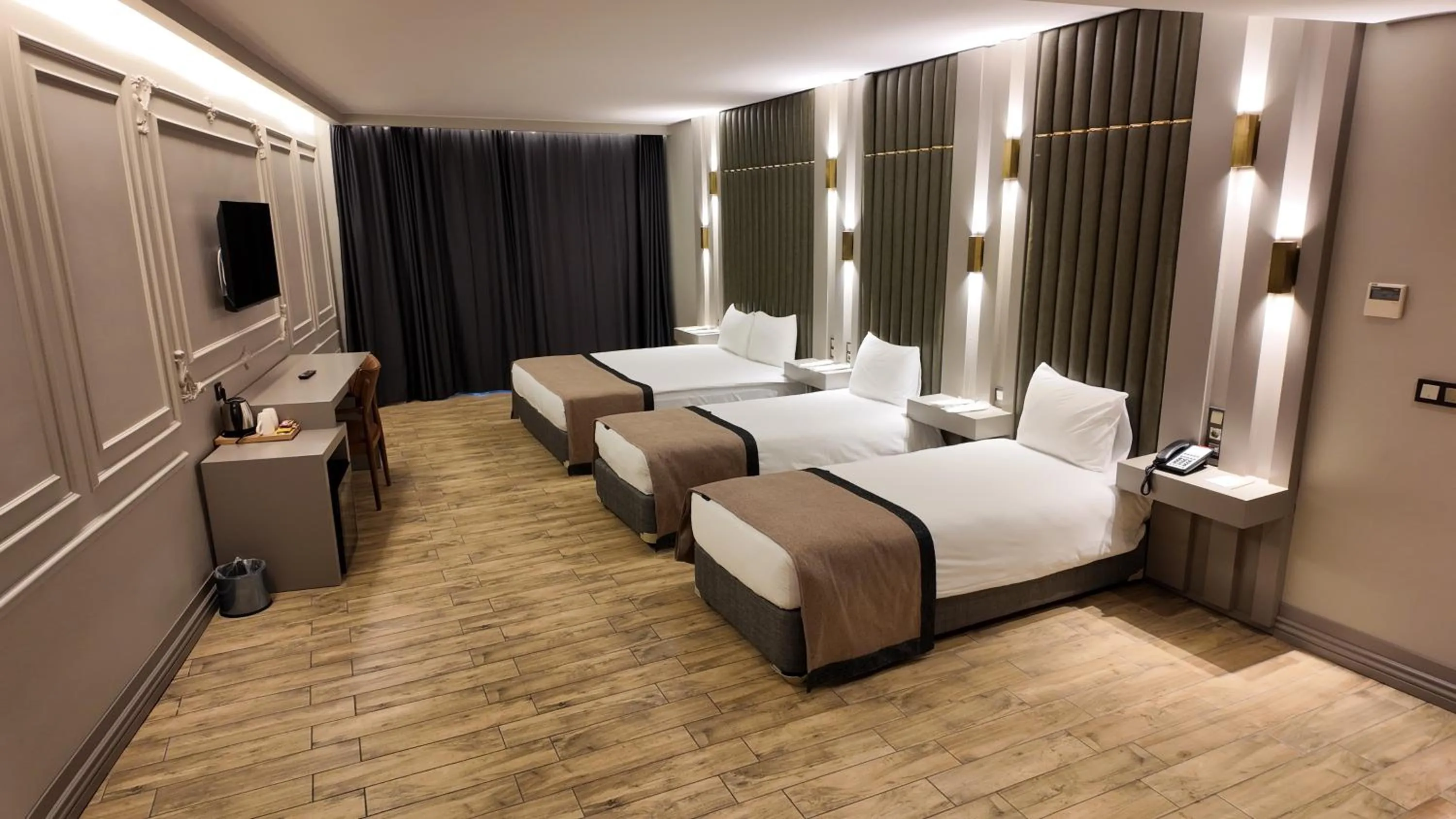 Bed in Lala Grand Hotel