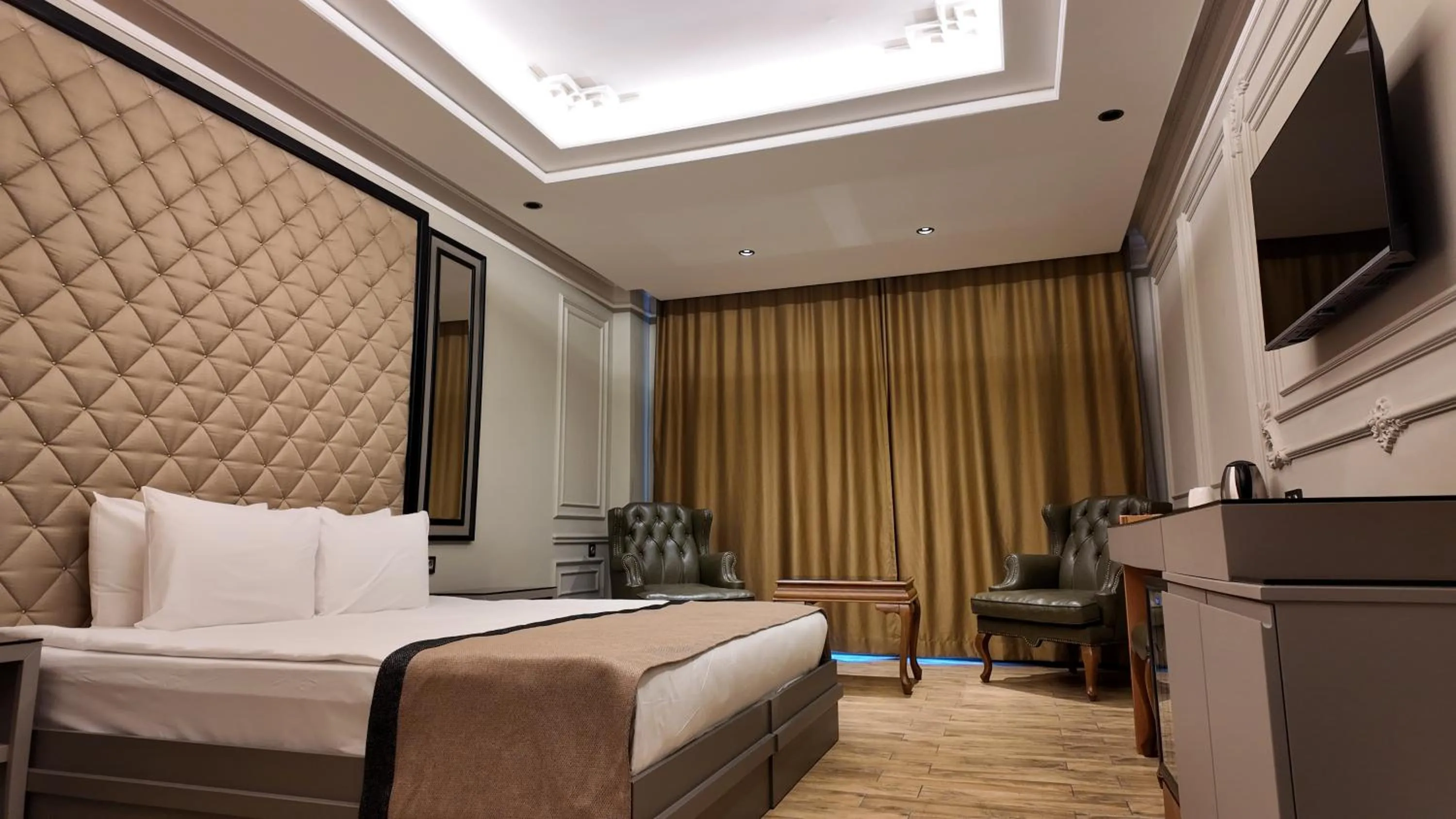 Bed in Lala Grand Hotel