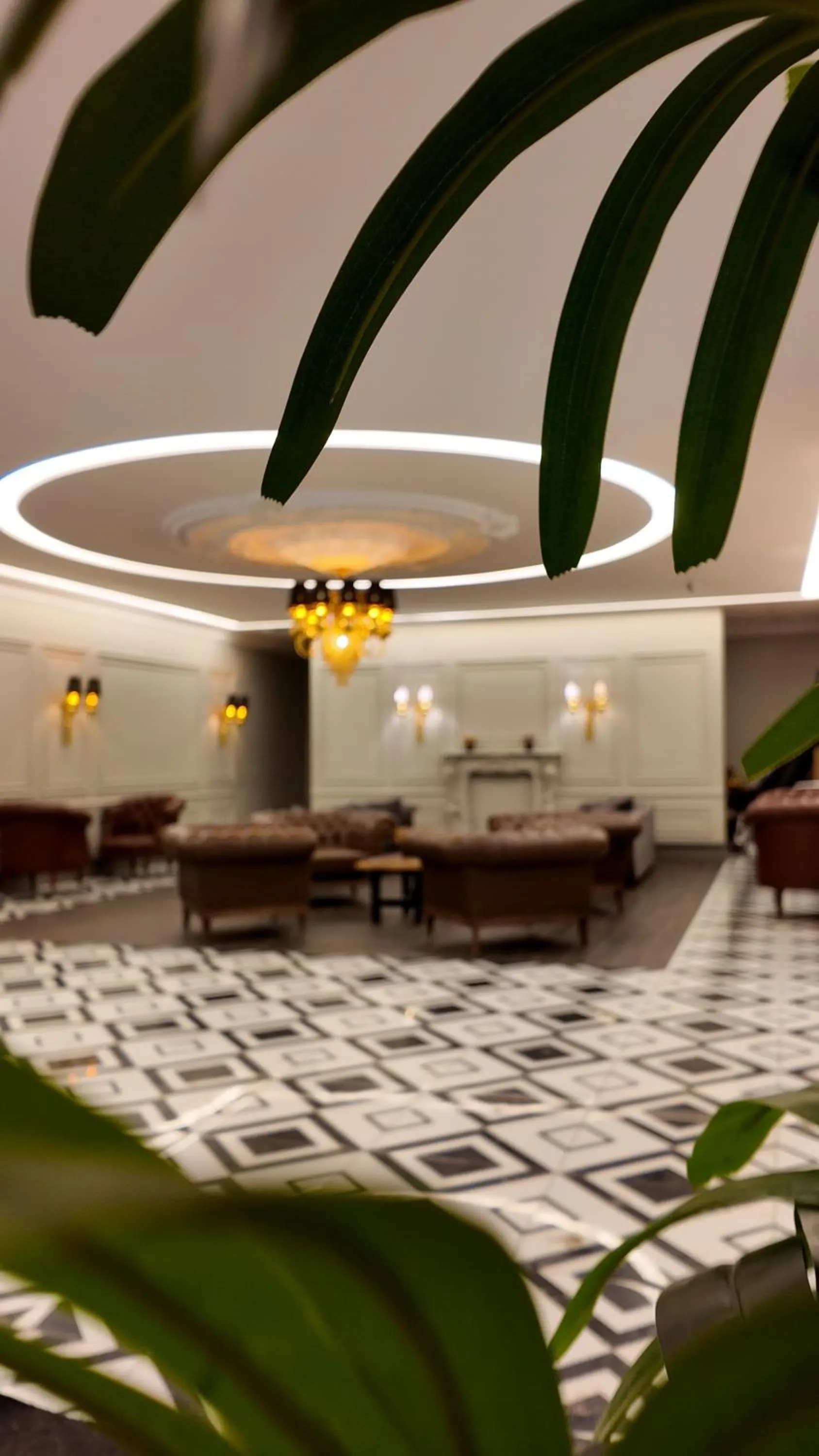 Communal lounge/ TV room in Lala Grand Hotel