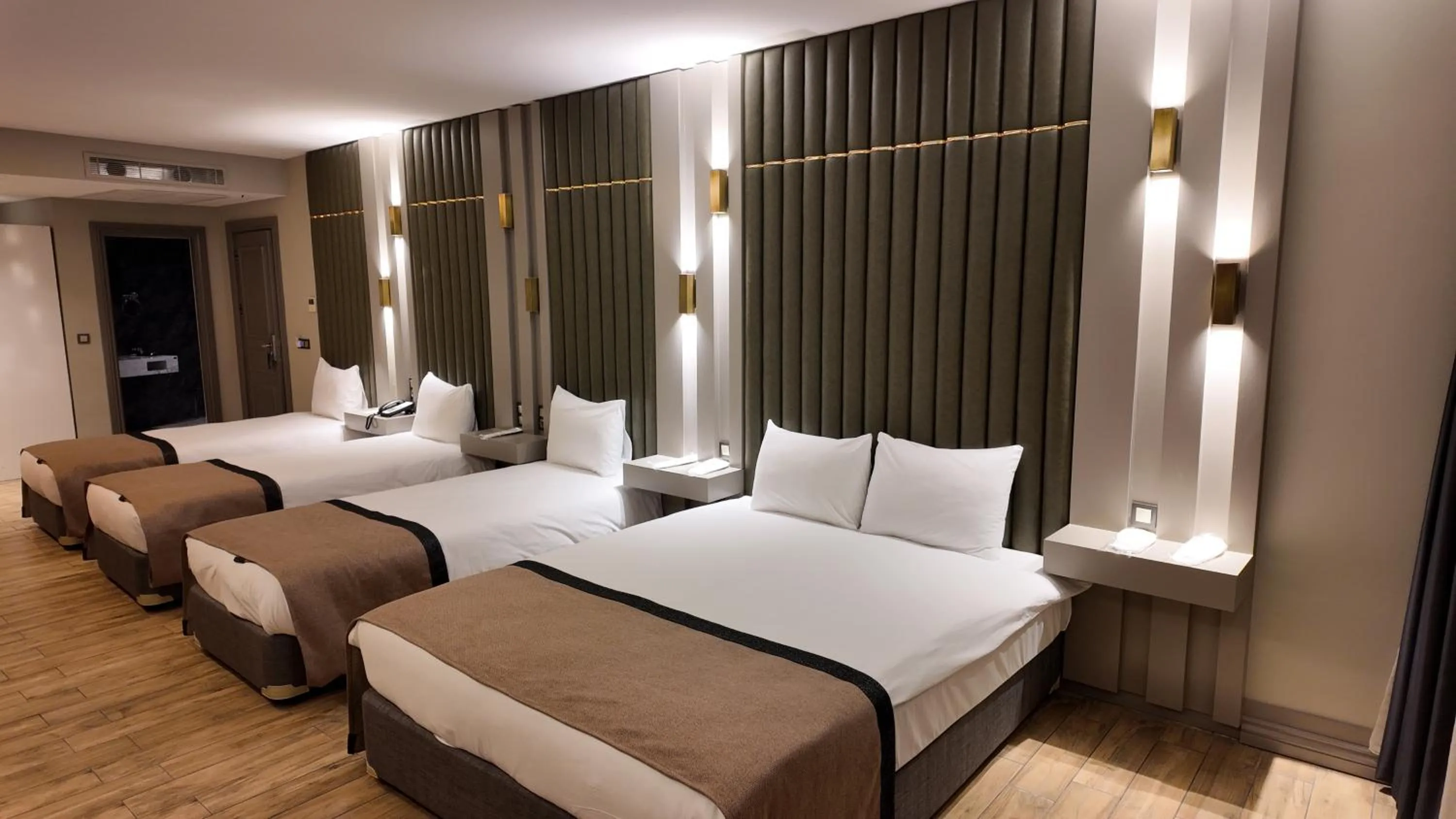 Bed in Lala Grand Hotel