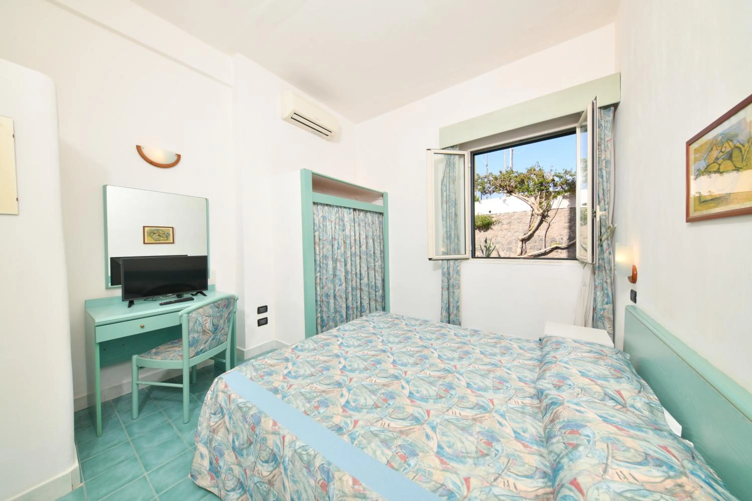 Bedroom in Fortuna Beach - Seaside Hotel