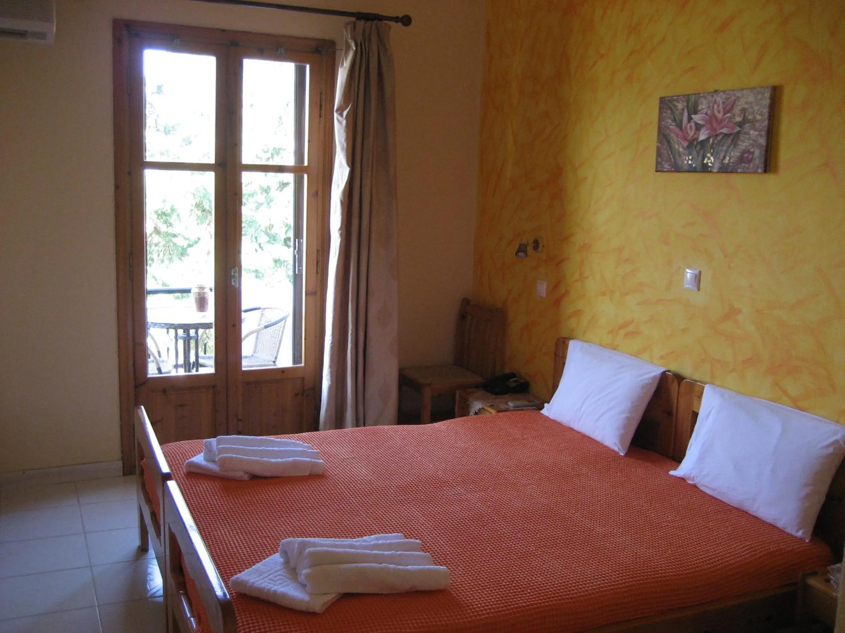 Bed in Thalia Hotel
