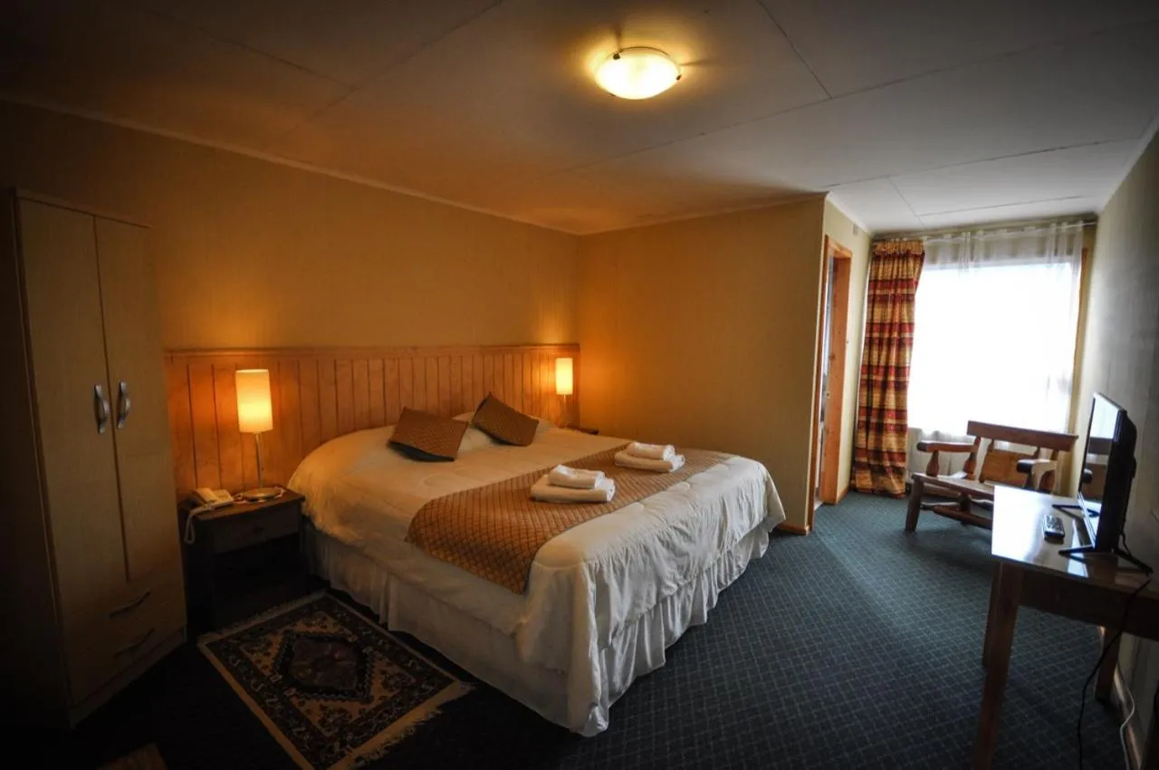 Bed in Hostal Los Pinos