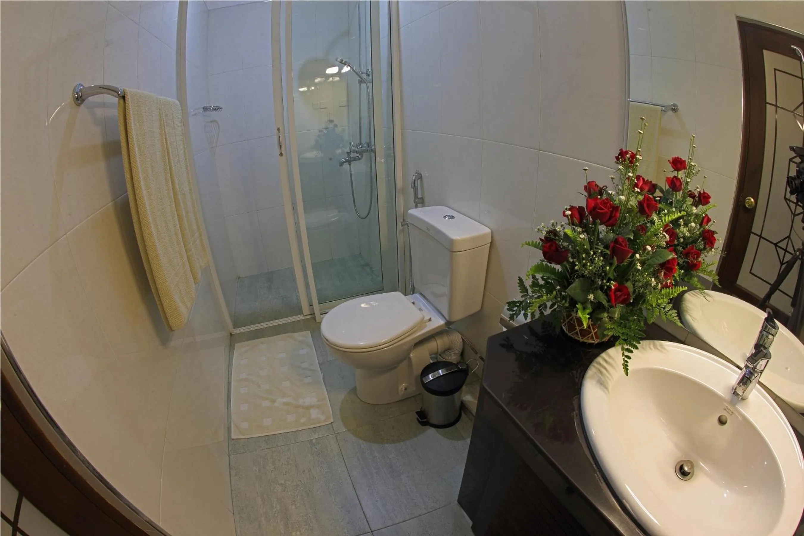 Bathroom in Cafe Aroma Inn