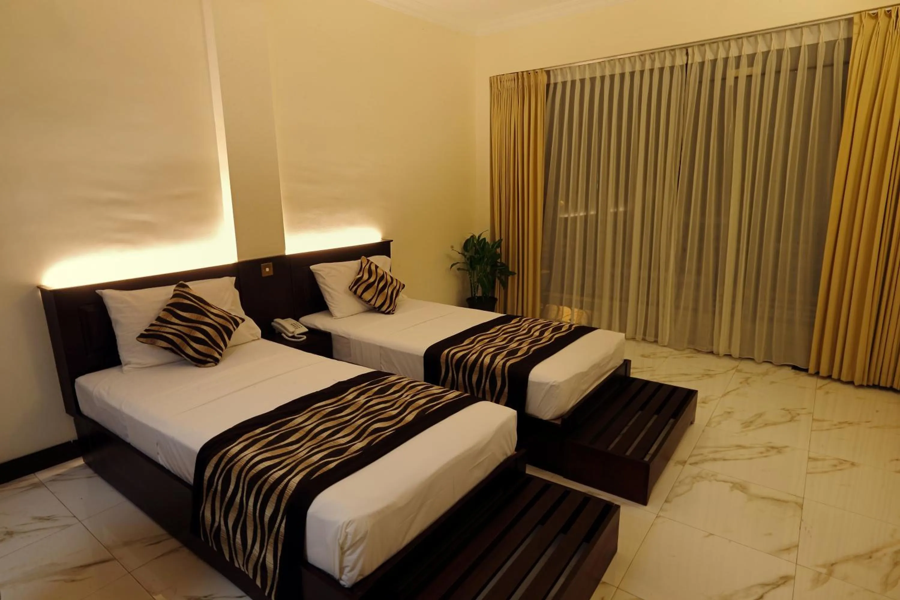 Bed in Cafe Aroma Inn