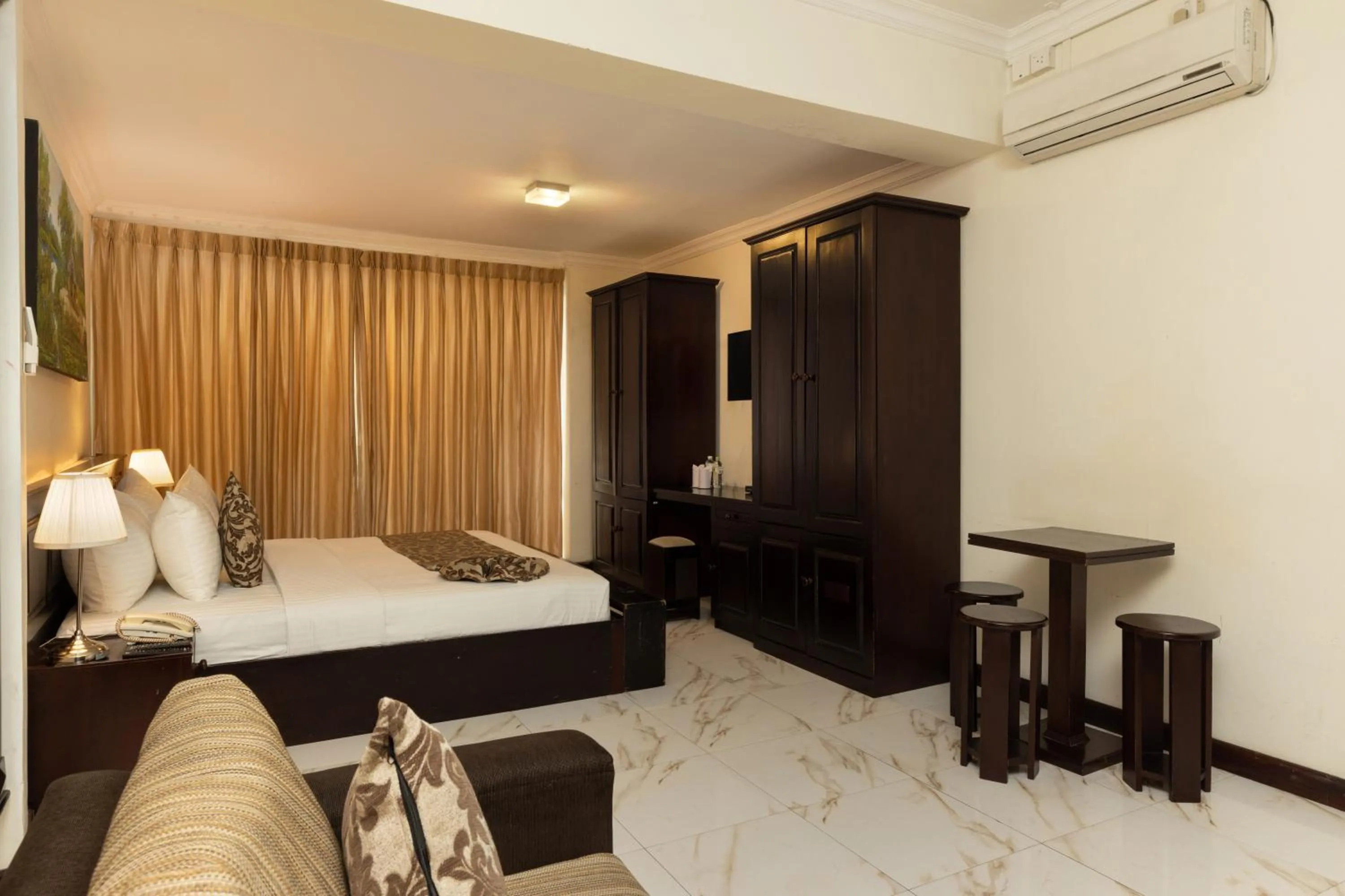 Photo of the whole room, Bed in Cafe Aroma Inn