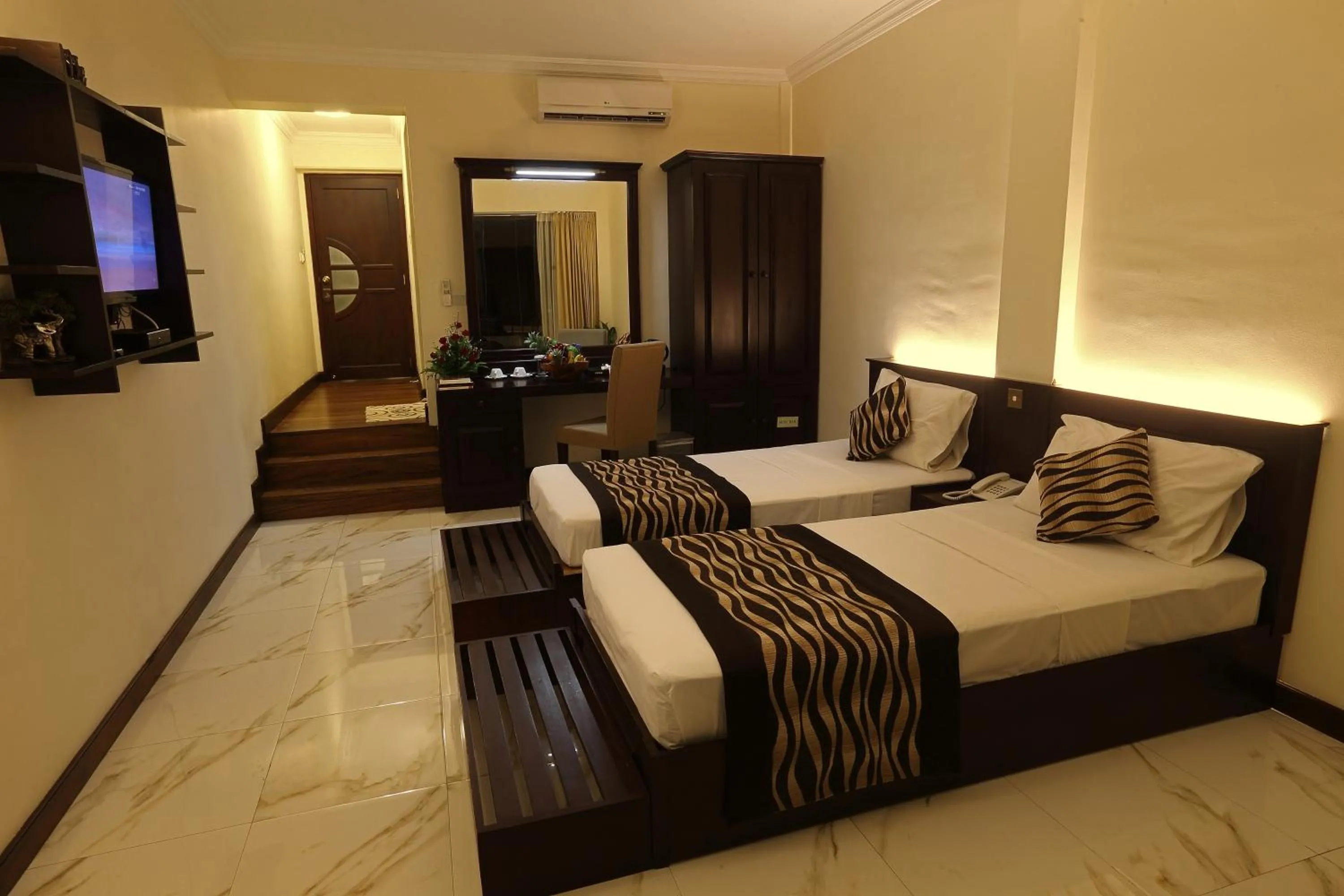 Photo of the whole room, Bed in Cafe Aroma Inn